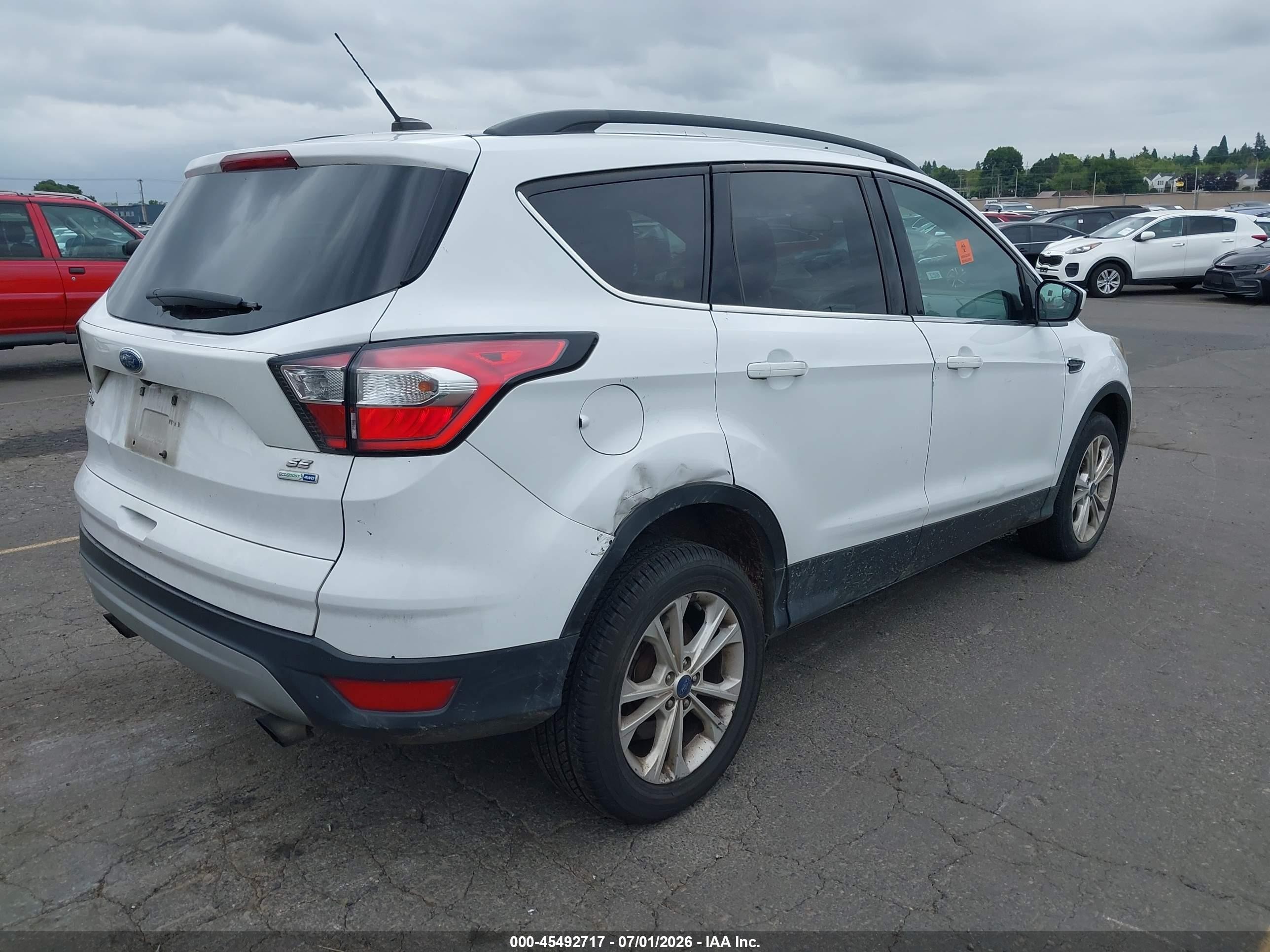 2018 Ford Escape VIN 1FMCU9GD9JUA87224 IAAI salvage auction — Normal Wear, Clear-Dealer Only (Oregon), sold $925 on 2026-07-09 (photo 4)