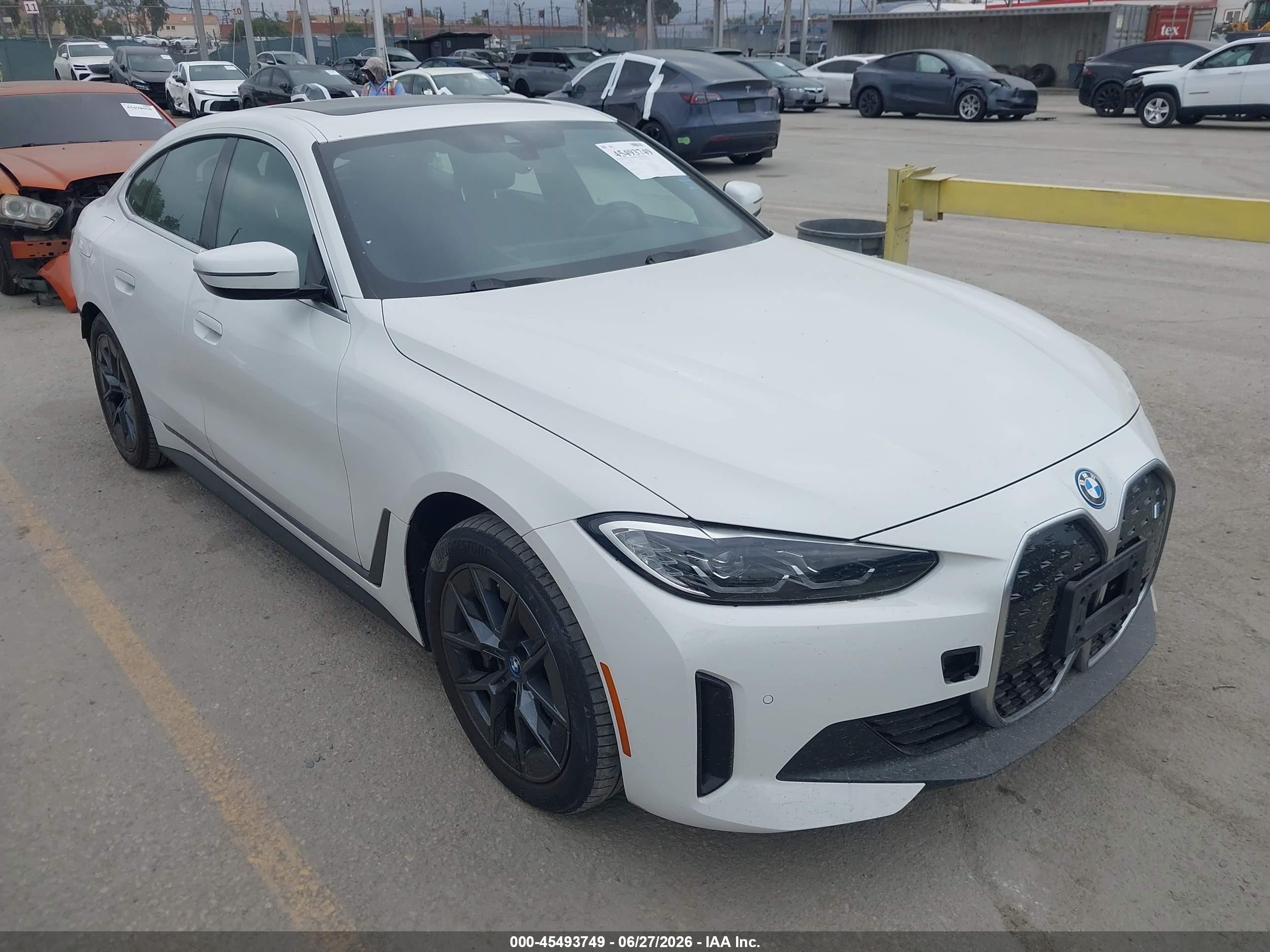 2024 BMW i4 VIN WBY43AW06RFS97242 — IAAI salvage auction photo