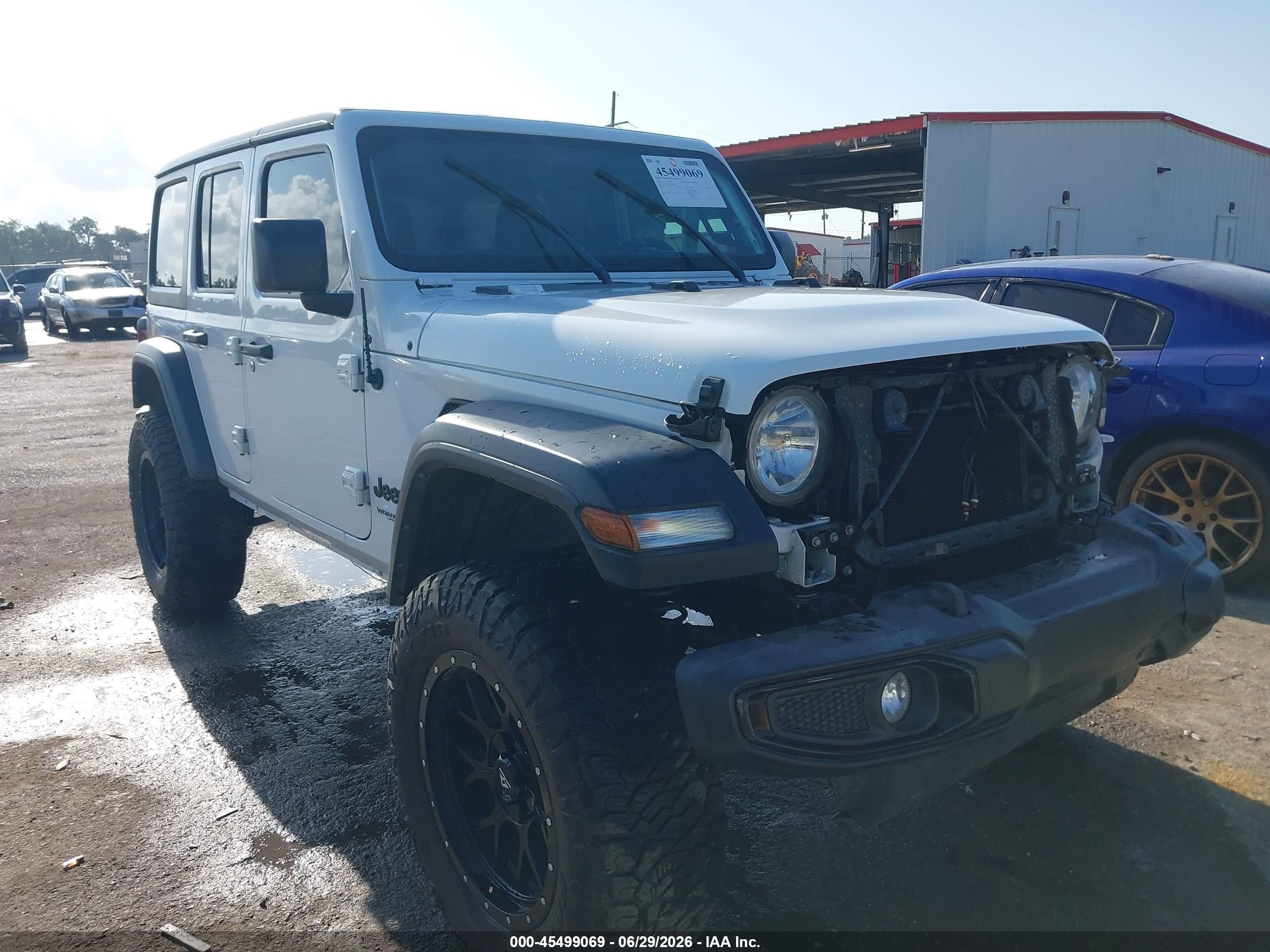 2021 Jeep Wrangler Unlimited VIN 1C4HJXDNXMW712050 — IAAI salvage auction photo
