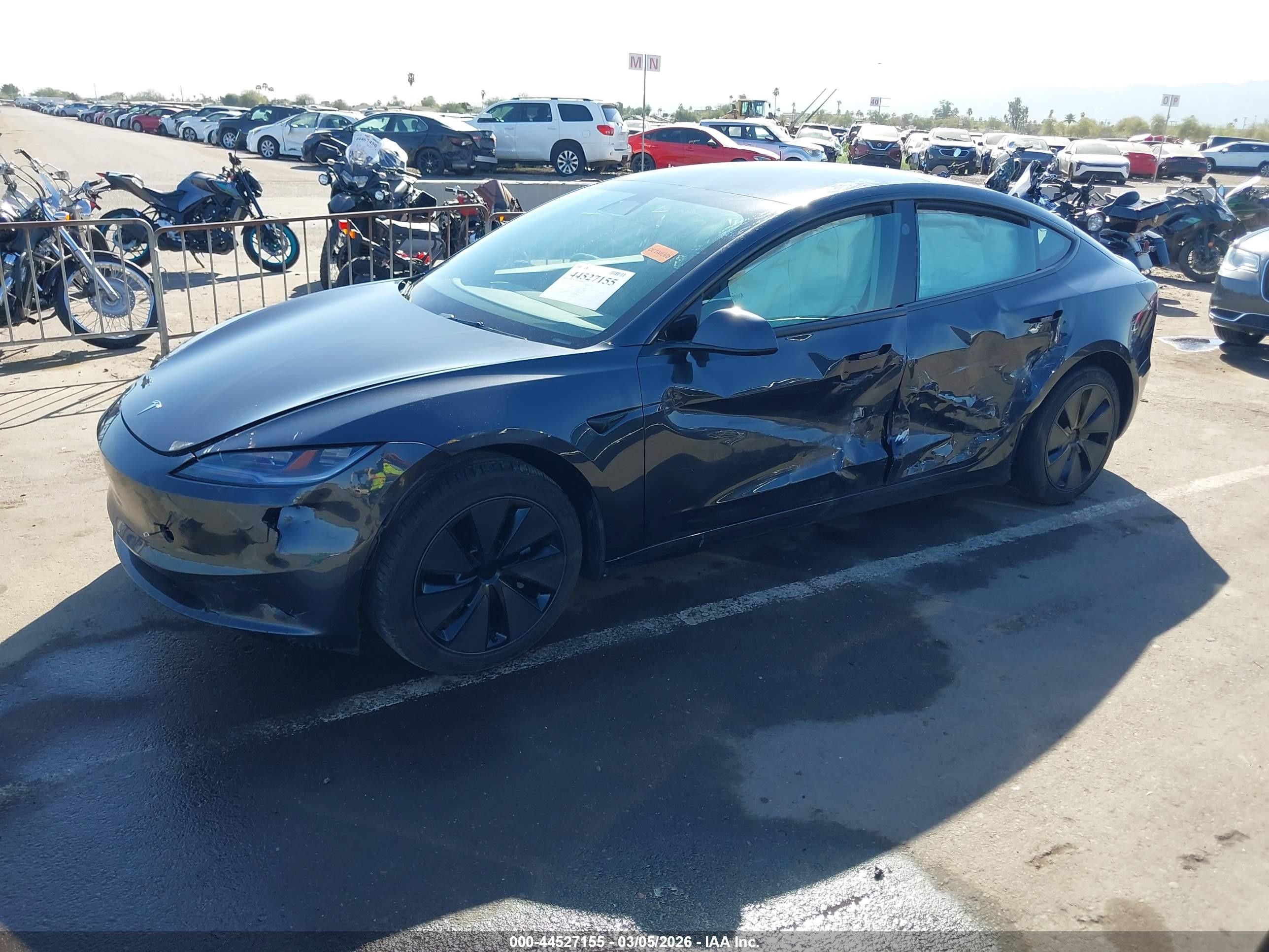 2025 Tesla Model 3 VIN 5YJ3E1EA6SF973104 IAAI salvage auction — Side, Salvage (Arizona), sold $13,325 on 2026-07-06 (photo 2)