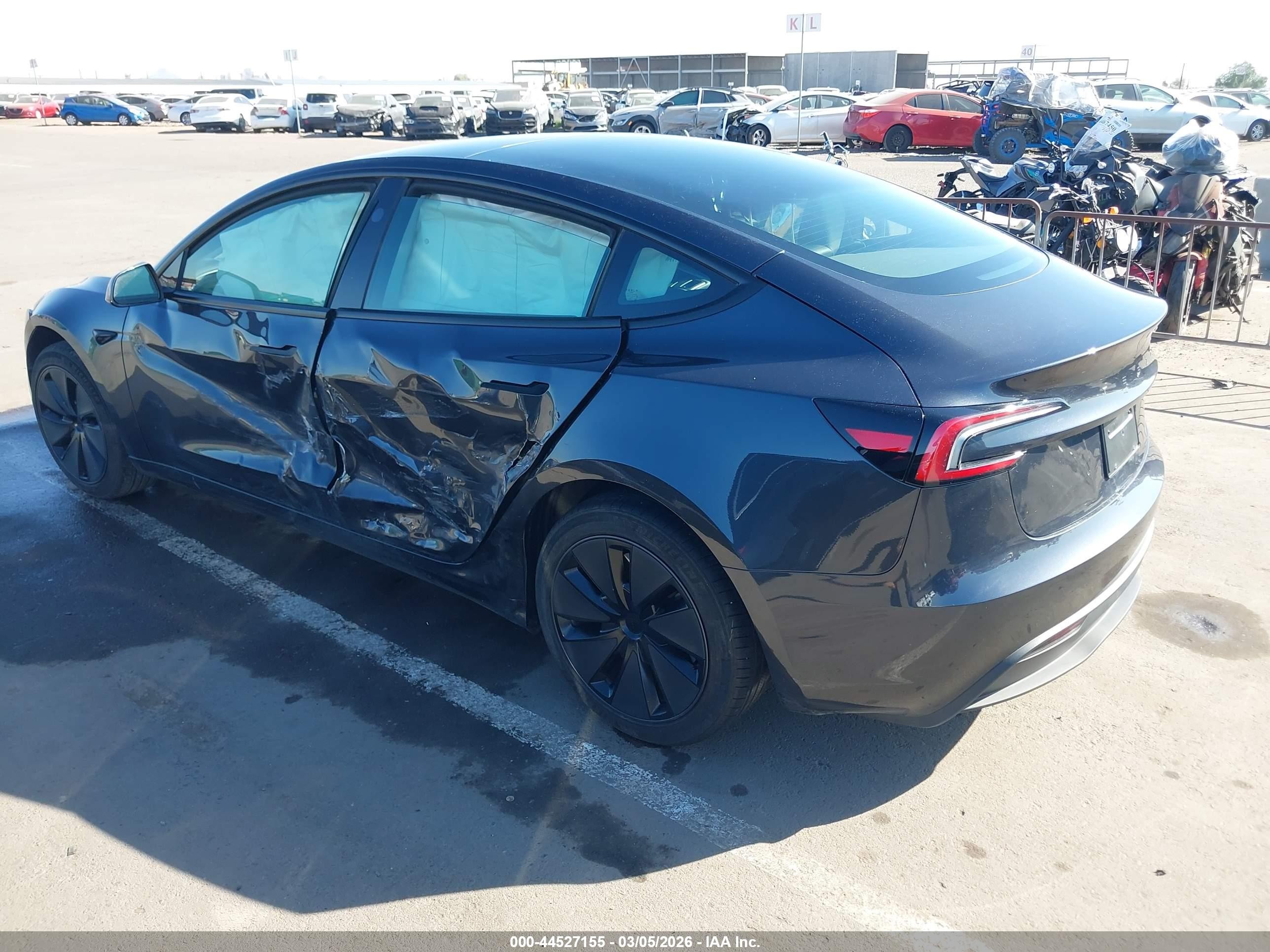 2025 Tesla Model 3 VIN 5YJ3E1EA6SF973104 IAAI salvage auction — Side, Salvage (Arizona), sold $13,325 on 2026-07-06 (photo 3)