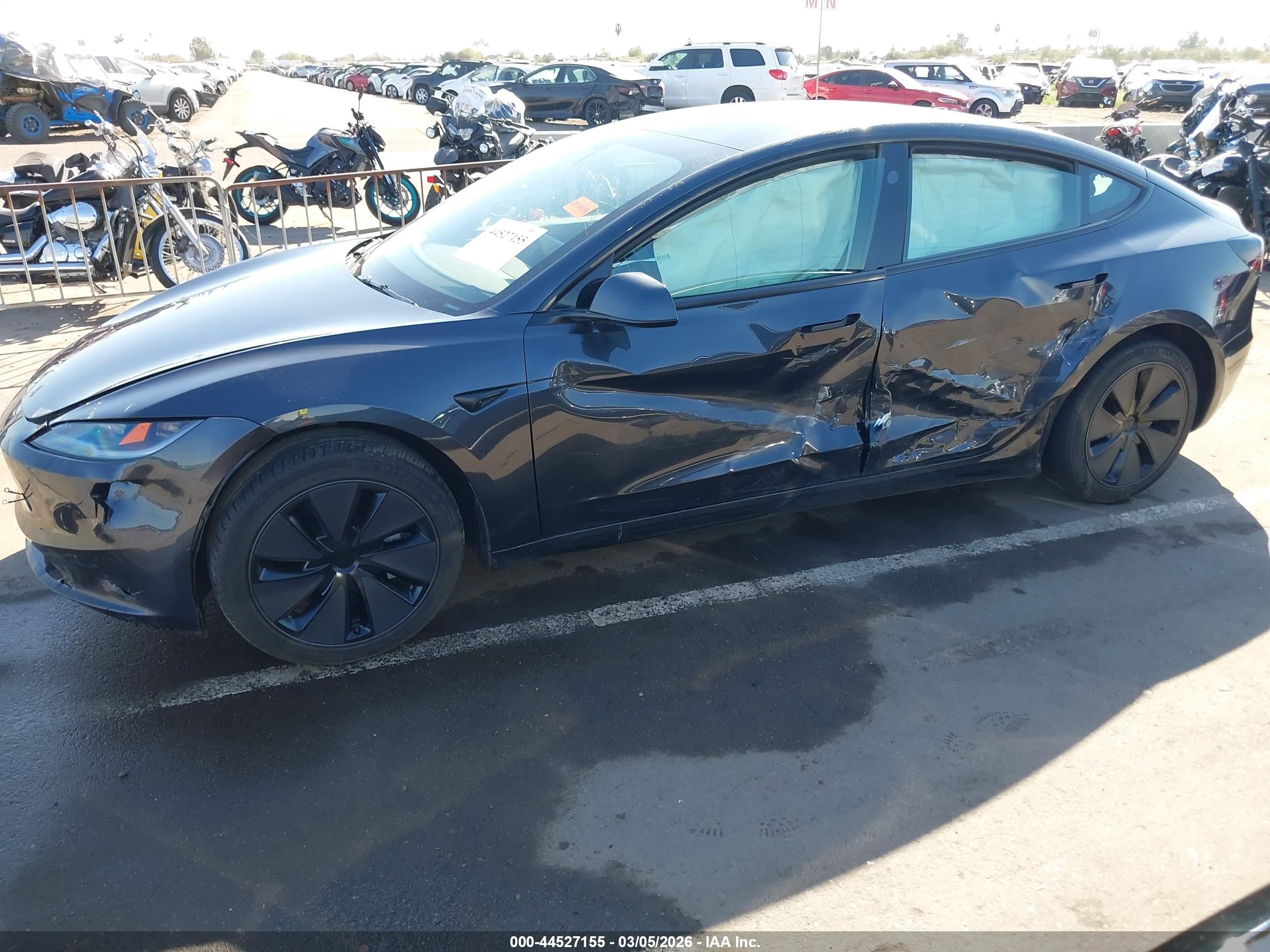 2025 Tesla Model 3 VIN 5YJ3E1EA6SF973104 IAAI salvage auction — Side, Salvage (Arizona), sold $13,325 on 2026-07-06 (photo 6)