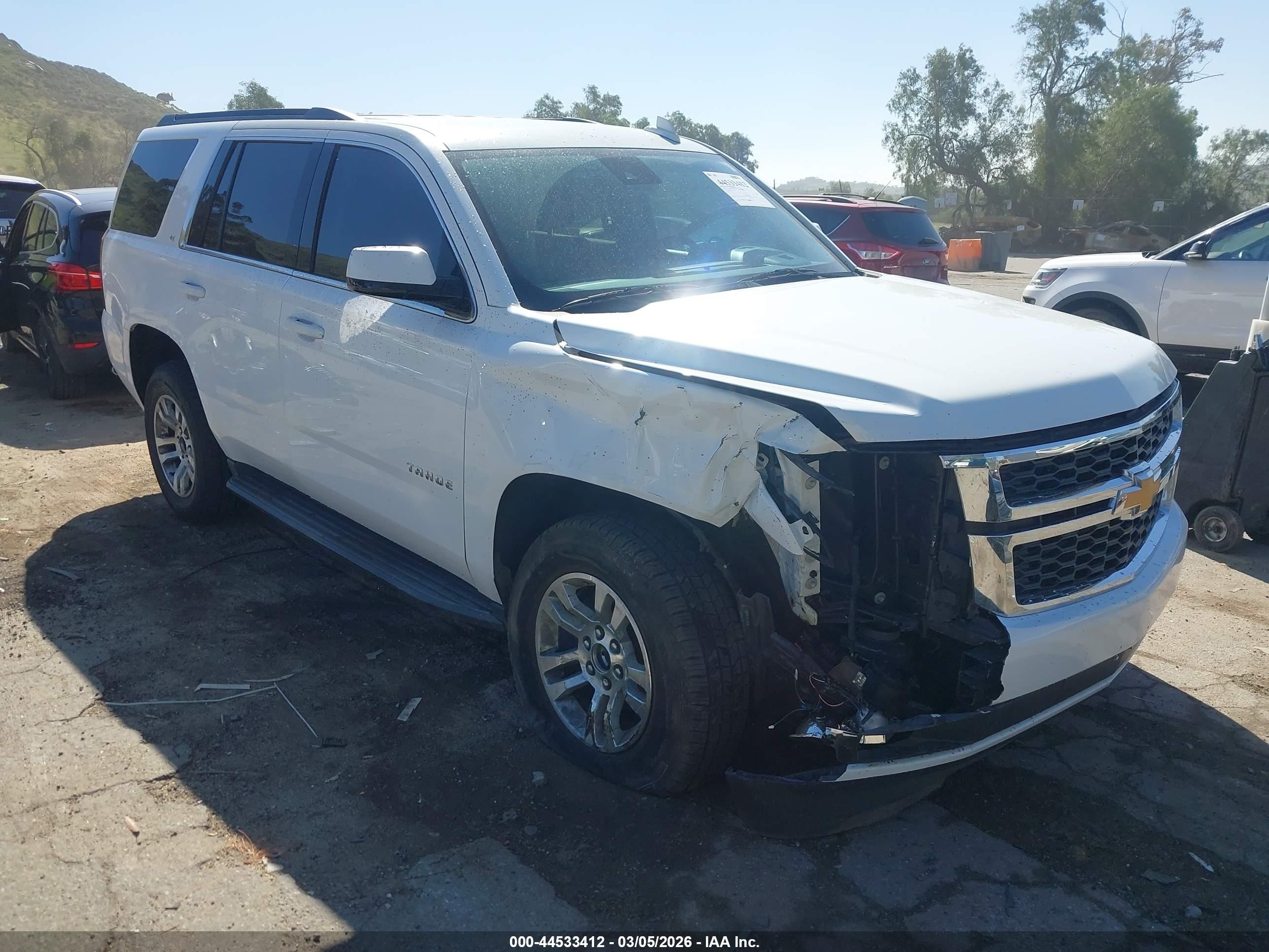 2019 Chevrolet Tahoe VIN 1GNSCBKC8KR390080 — IAAI salvage auction photo