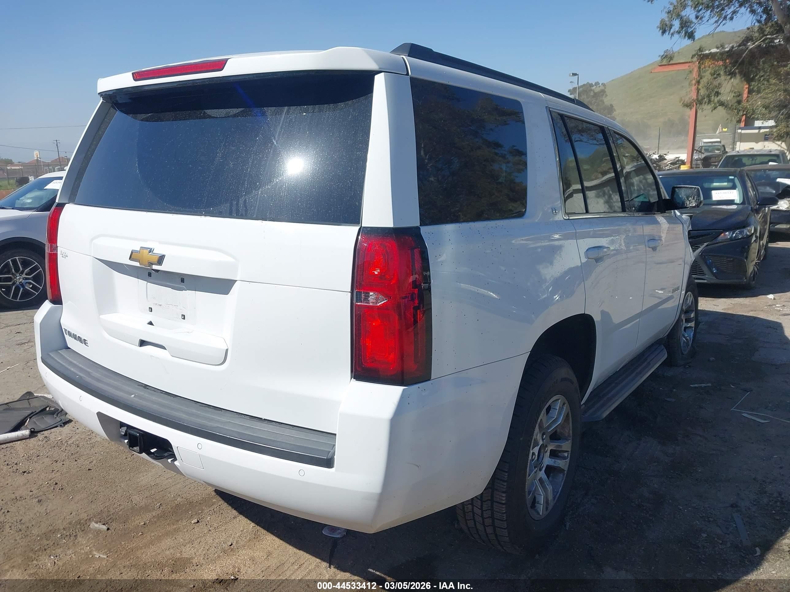 2019 Chevrolet Tahoe VIN 1GNSCBKC8KR390080 IAAI salvage auction — Unknown, Salvage (California), sold $7,875 on 2026-07-07 (photo 4)