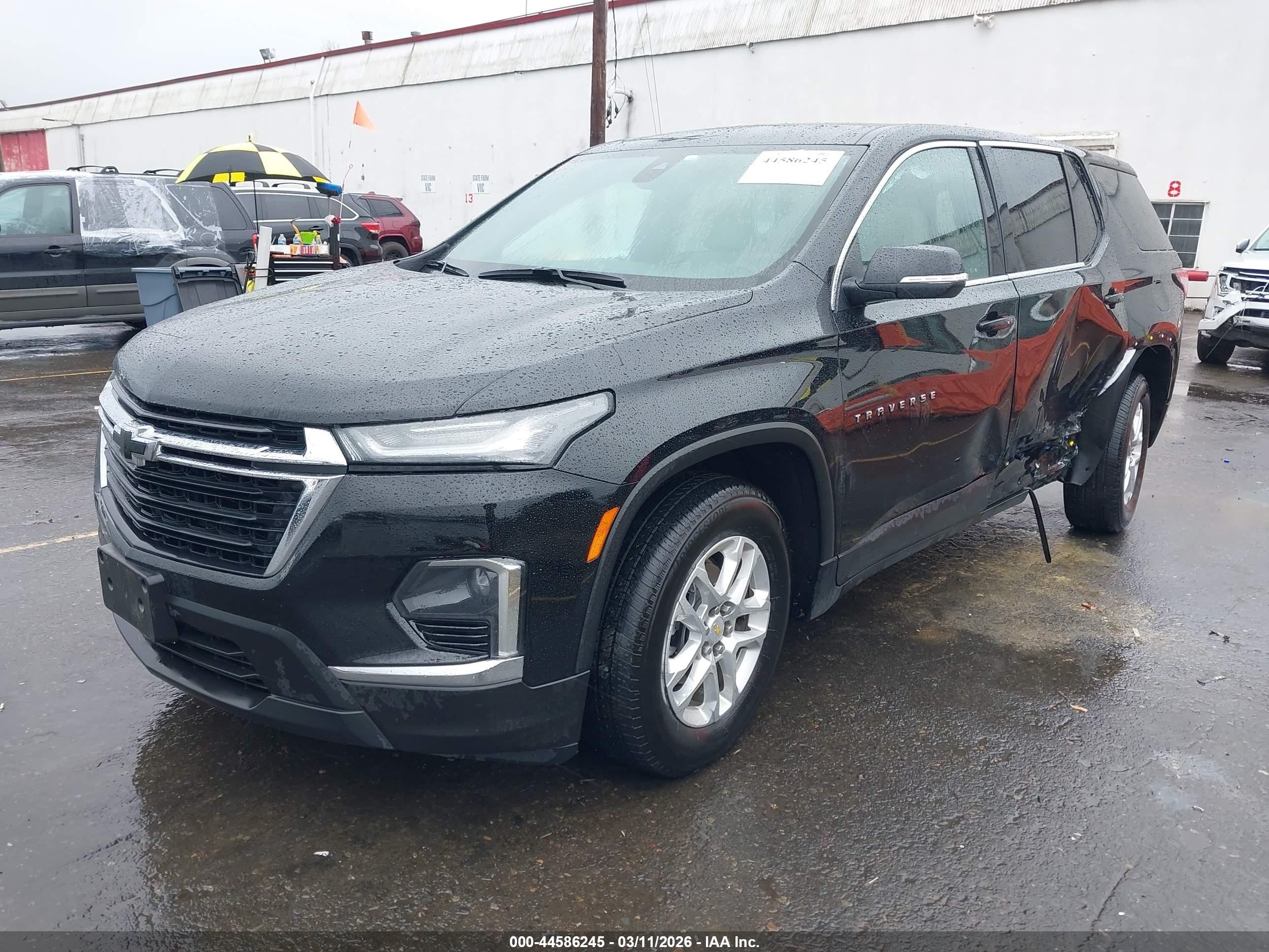 2023 Chevrolet Traverse VIN 1GNEVFKW8PJ337832 IAAI salvage auction — Side, Salvage (Oregon), sold $6,700 on 2026-07-09 (photo 2)