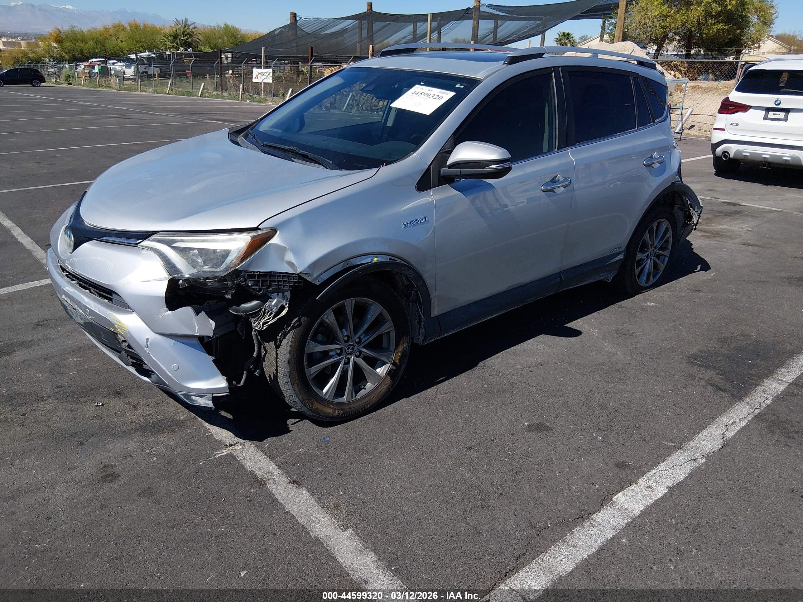 2016 Toyota RAV4 Hybrid VIN JTMDJREV6GD010848 IAAI salvage auction — Rear End, Salvage (Nevada), sold $2,550 on 2026-07-01 (photo 2)