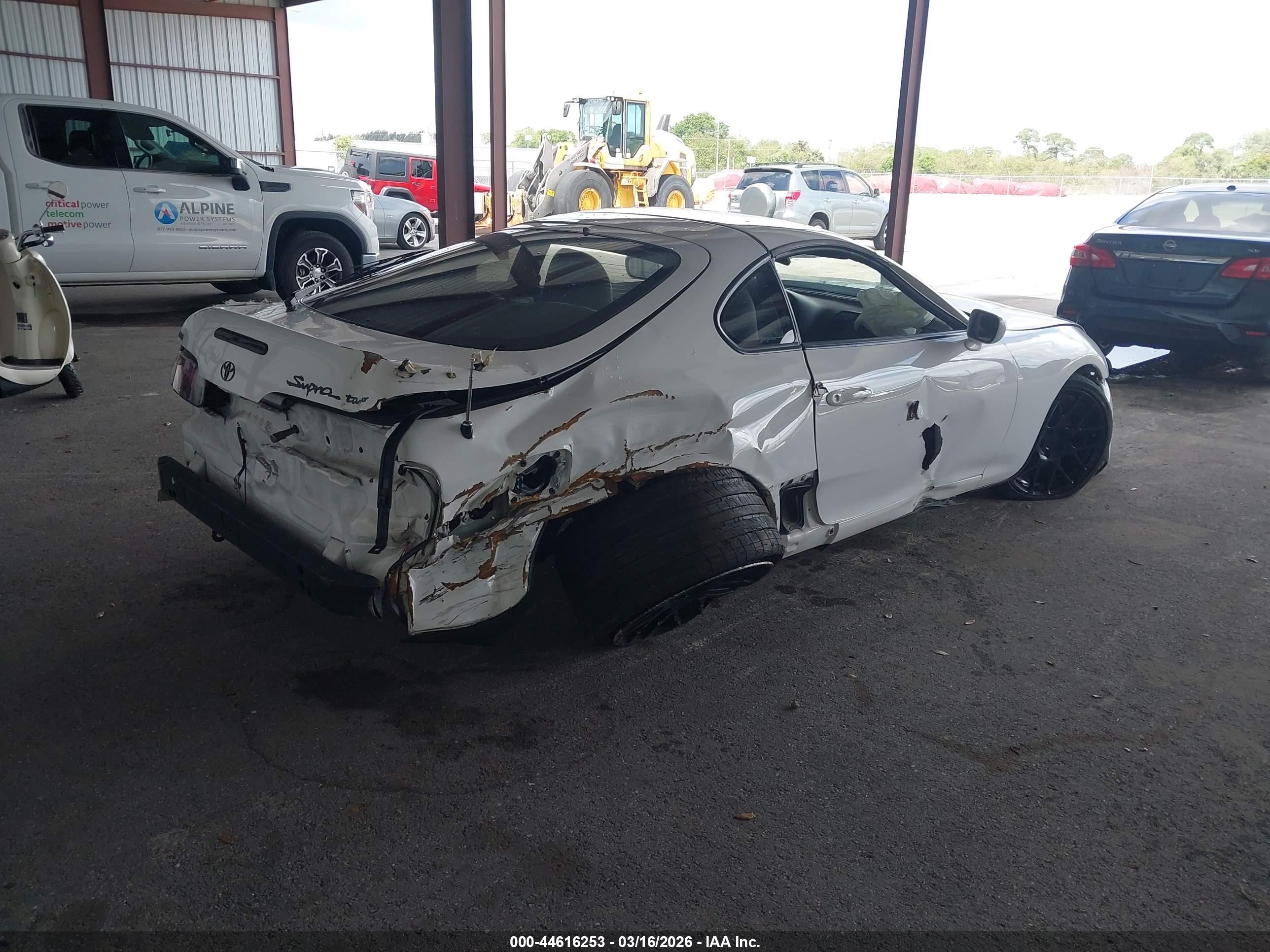 1998 Toyota Supra VIN JT2DE82A8W1001626 IAAI salvage auction — Rear End, Rebuildable (Florida), sold $26,400 on 2026-03-30 (photo 4)