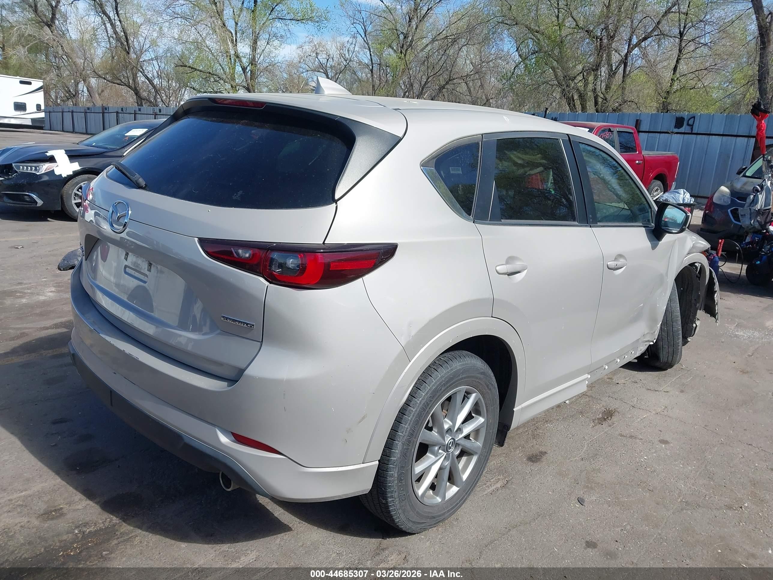 2024 Mazda CX-5 VIN JM3KFBBL6R0446183 IAAI salvage auction — Side, Rebuildable (Florida), sold $7,100 on 2026-07-02 (photo 4)