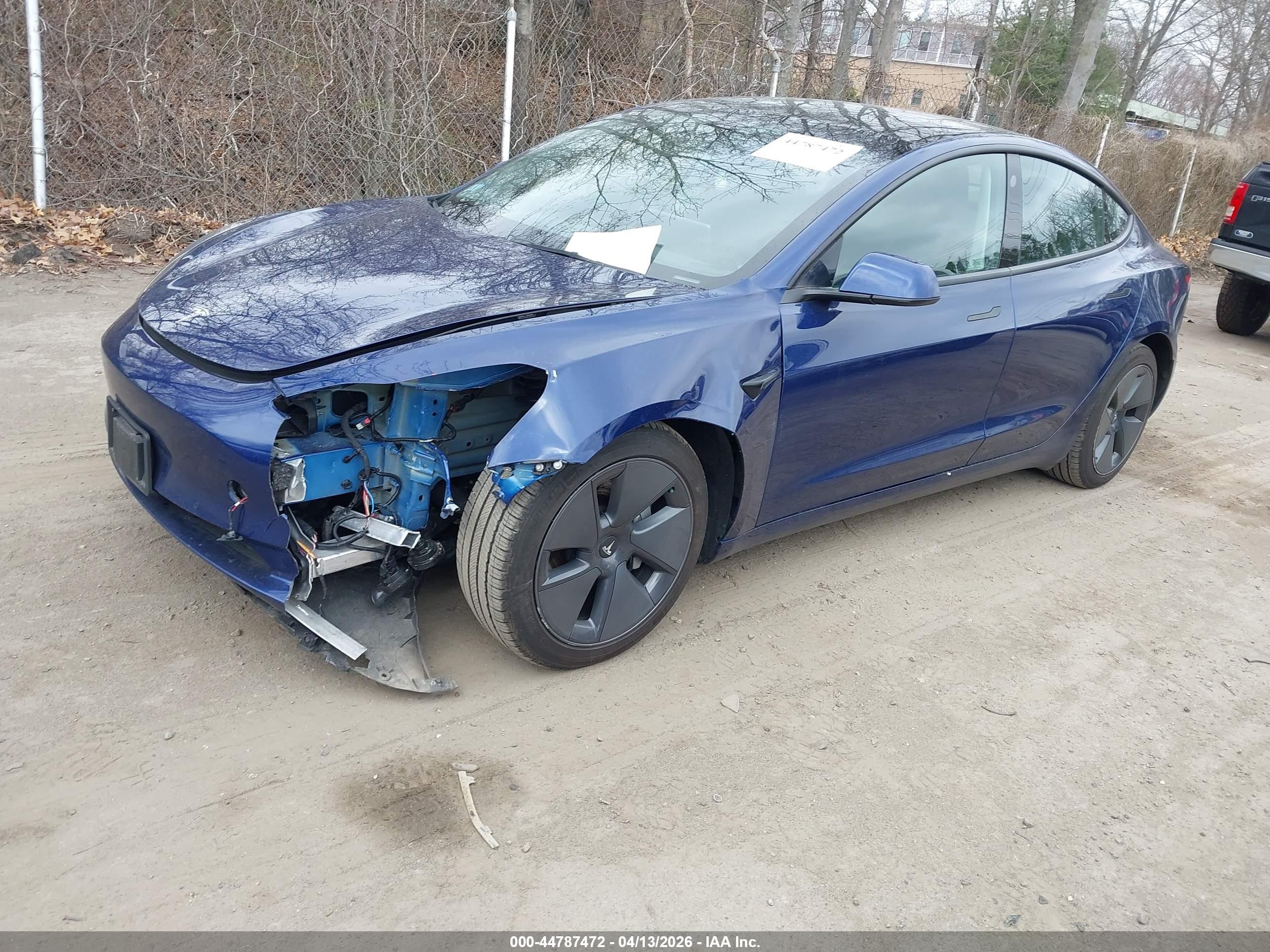 2022 Tesla Model 3 VIN 5YJ3E1EA3NF252162 IAAI salvage auction — Unknown, Salvage (Massachusetts), sold $7,700 on 2026-10-01 (photo 2)