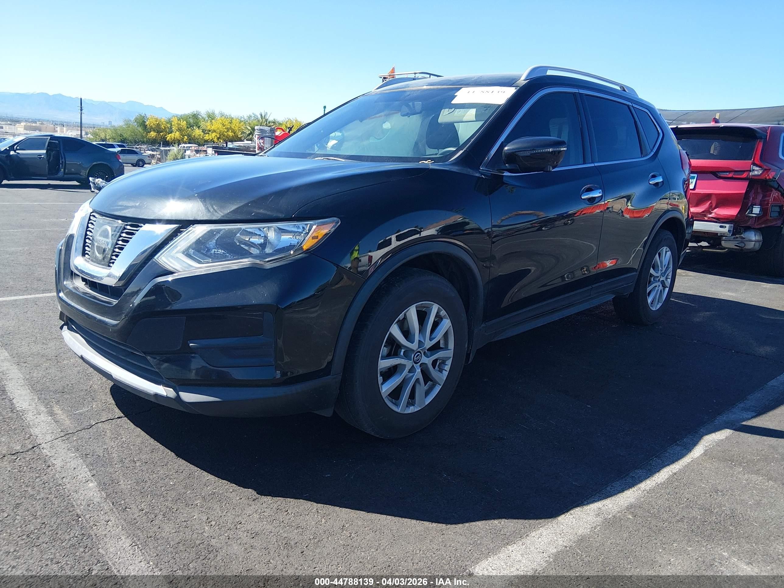 2017 Nissan Rogue VIN KNMAT2MT3HP575983 IAAI salvage auction — Side, Salvage (Nevada), sold $1,900 on 2026-07-01 (photo 2)