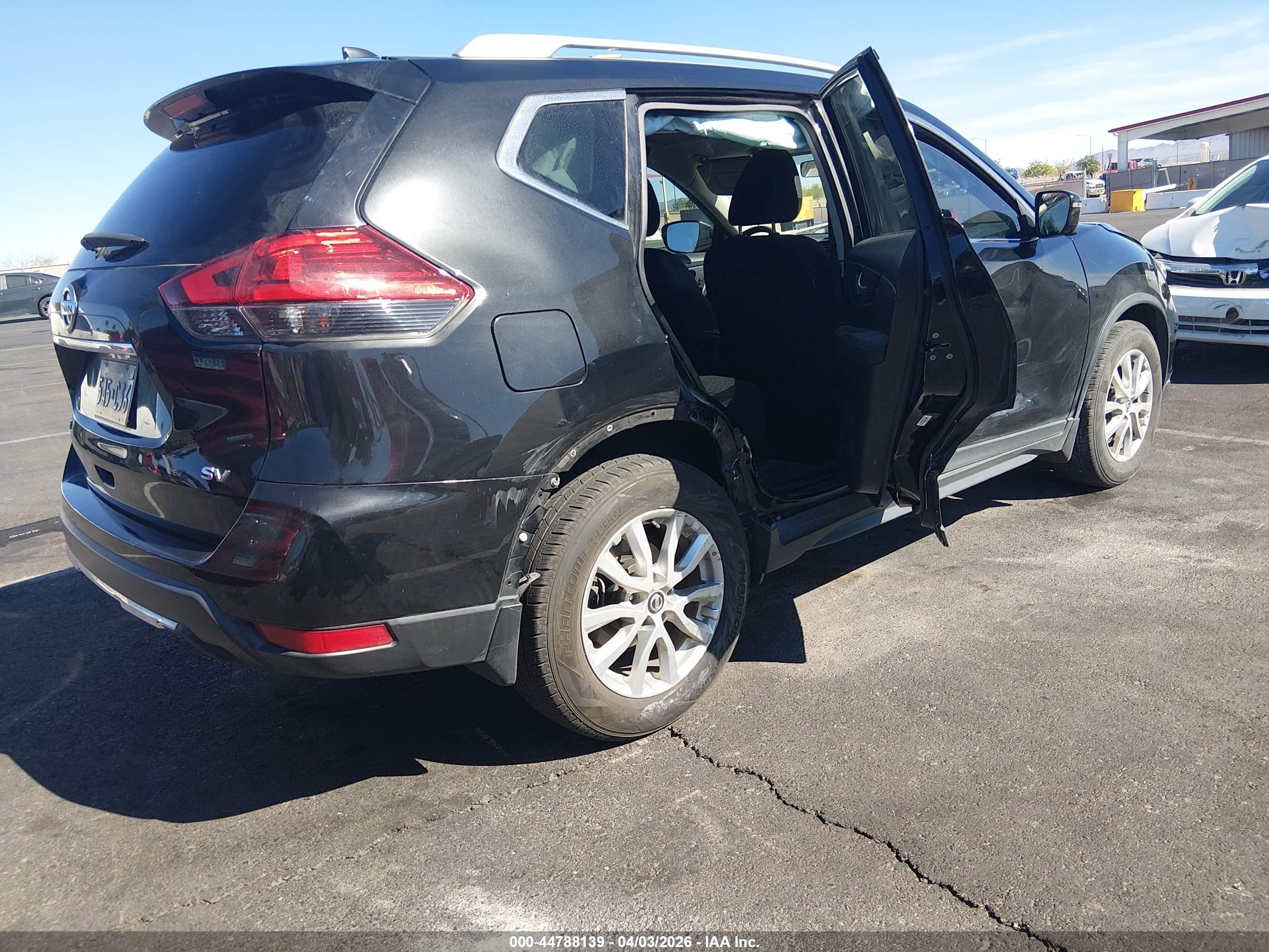 2017 Nissan Rogue VIN KNMAT2MT3HP575983 IAAI salvage auction — Side, Salvage (Nevada), sold $1,900 on 2026-07-01 (photo 4)