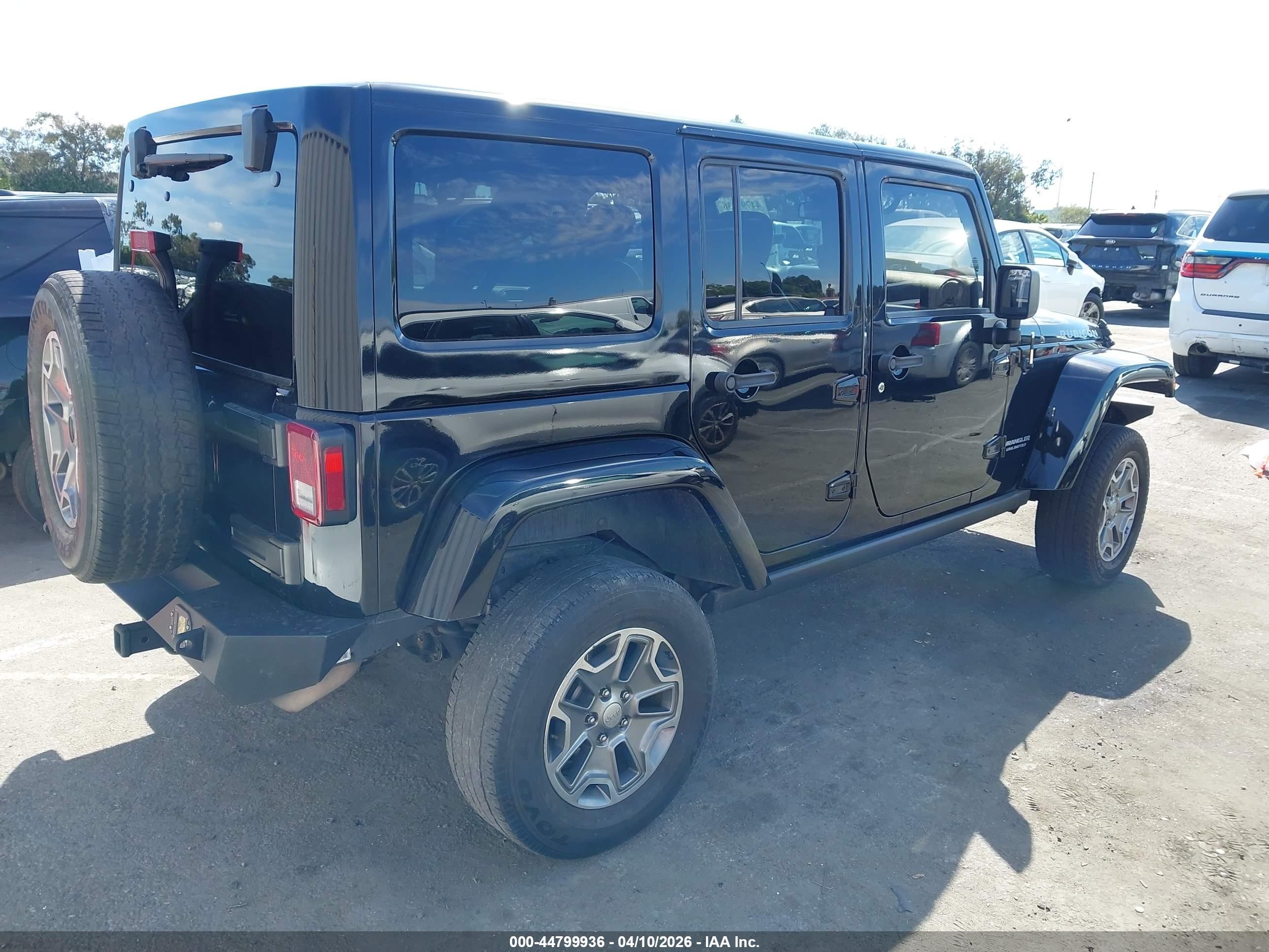 2015 Jeep Wrangler Unlimited VIN 1C4BJWFG5FL538116 IAAI salvage auction — Side, Salvage (California), sold $3,950 on 2026-07-09 (photo 4)