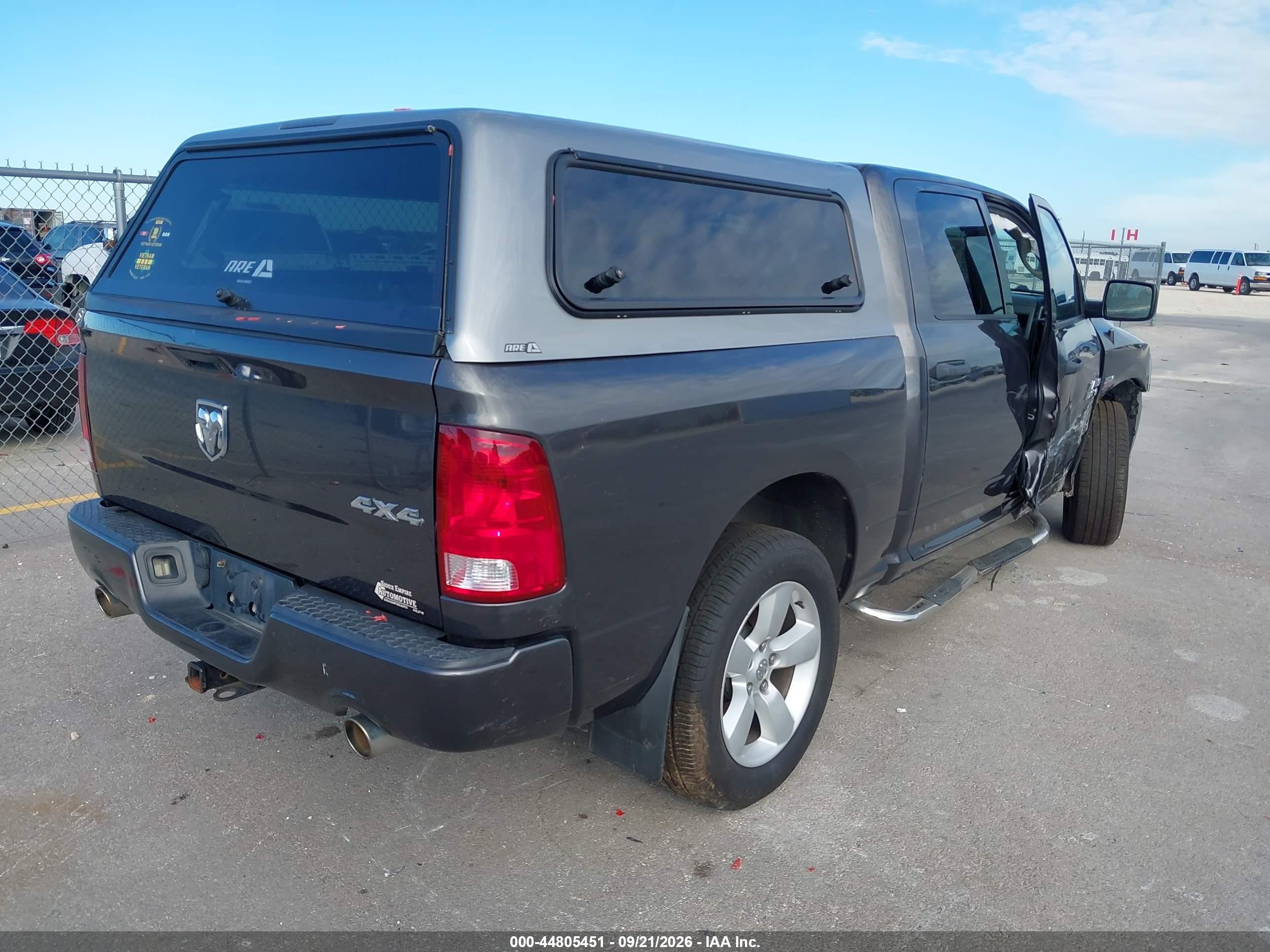 2014 Ram 1500 VIN 1C6RR7KT6ES469304 IAAI salvage auction — Unknown, Regular (South Dakota), sold $5,025 on 2026-09-25 (photo 4)