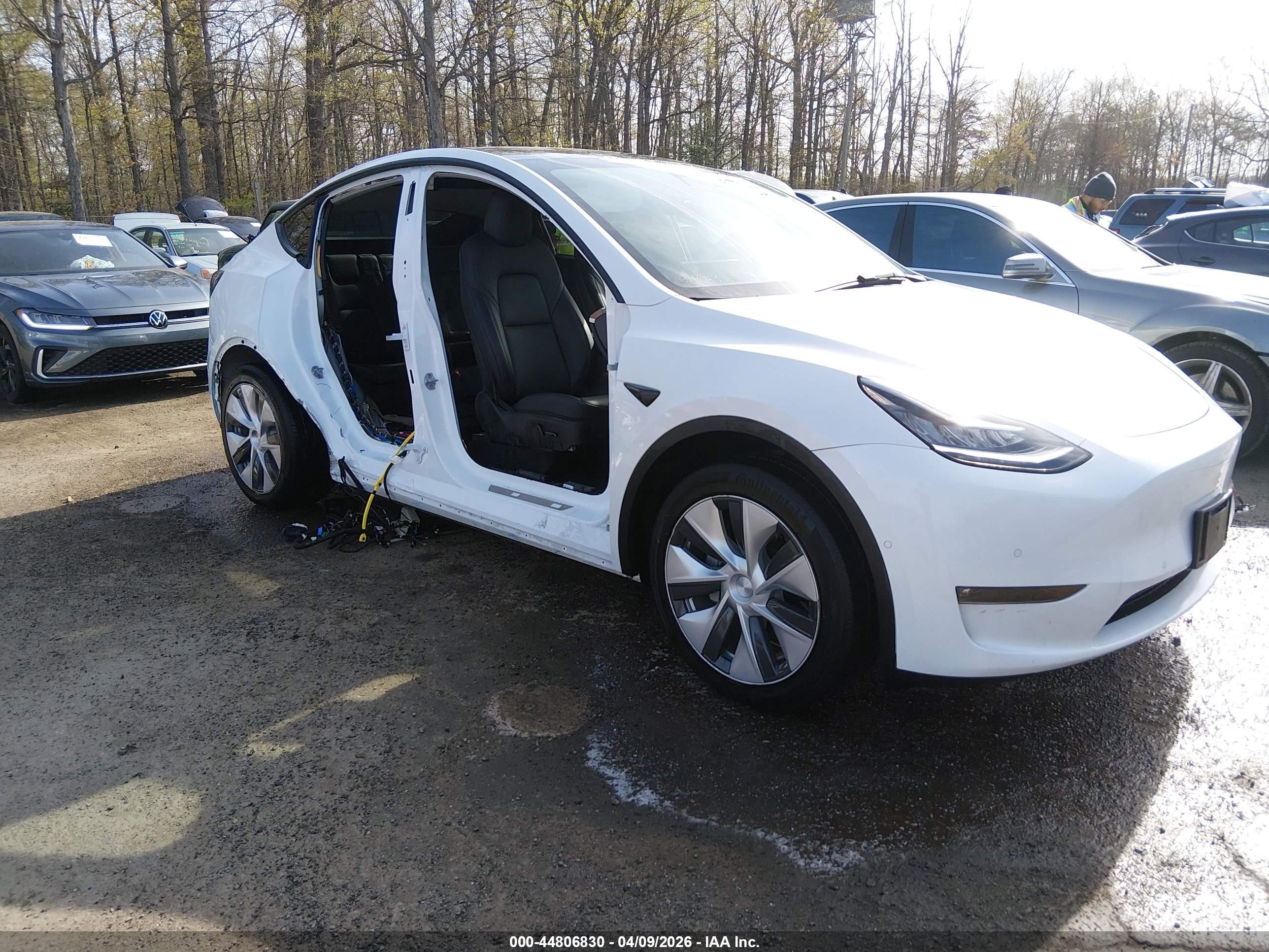 2022 Tesla Model Y VIN 7SAYGAEE5NF508520 IAAI salvage auction — Side, Salvage - 75% Or Less (Maryland), sold $9,100 on 2026-09-11 (photo 1)