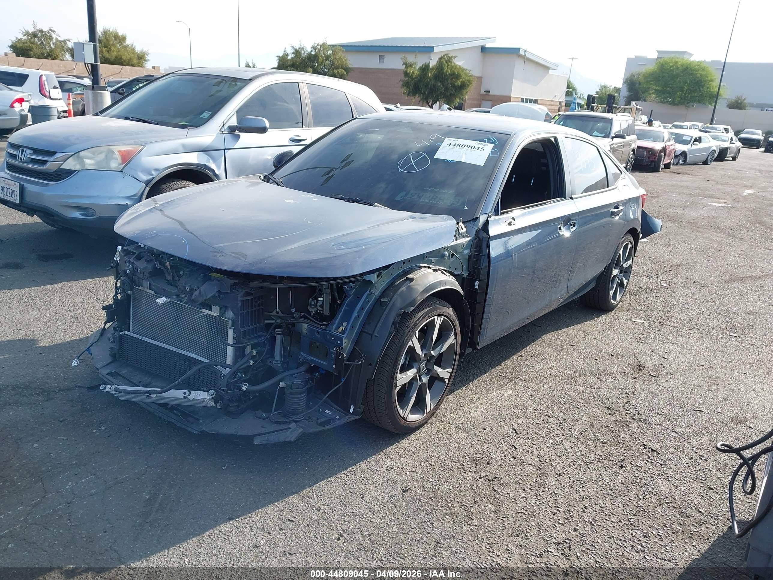 2025 Honda Civic Hybrid VIN 2HGFE4F80SH345366 IAAI salvage auction — Front & Rear, Salvage Certificate (California), sold $9,300 on 2026-07-13 (photo 2)