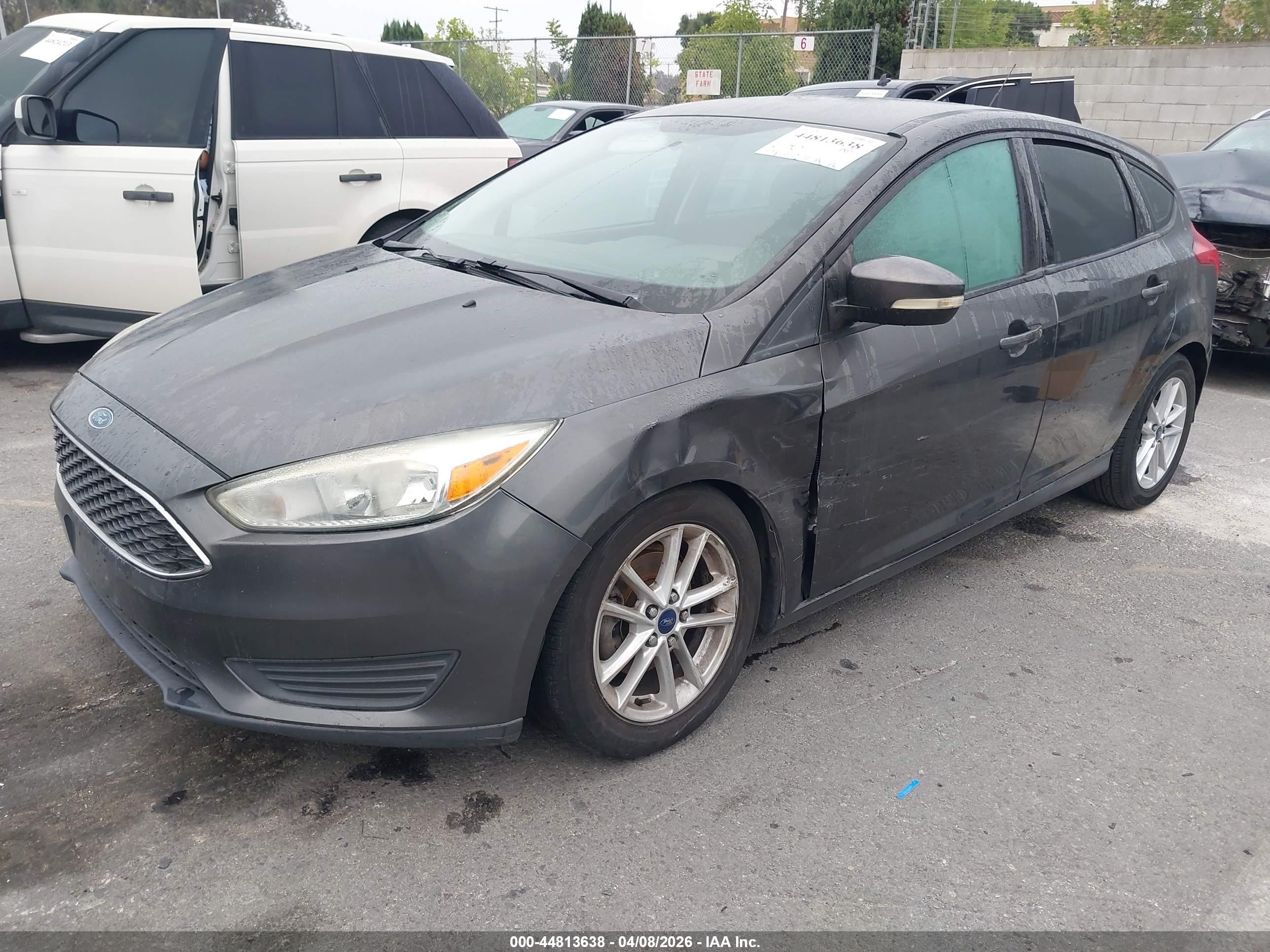 2016 Ford Focus VIN 1FADP3K26GL320063 IAAI salvage auction — Side, Salvage (California), sold $975 on 2026-07-07 (photo 2)