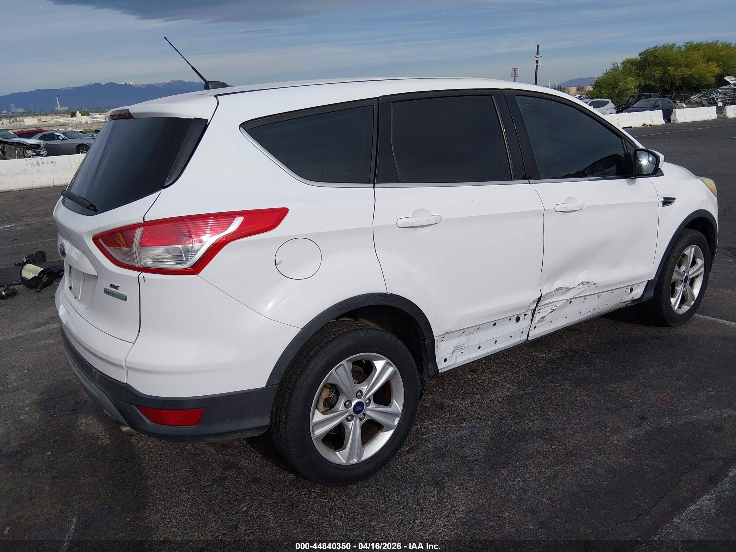 2014 Ford Escape VIN 1FMCU0GX5EUB64389 IAAI salvage auction — Normal Wear, Salvage (Texas), sold $100 on 2026-07-10 (photo 4)