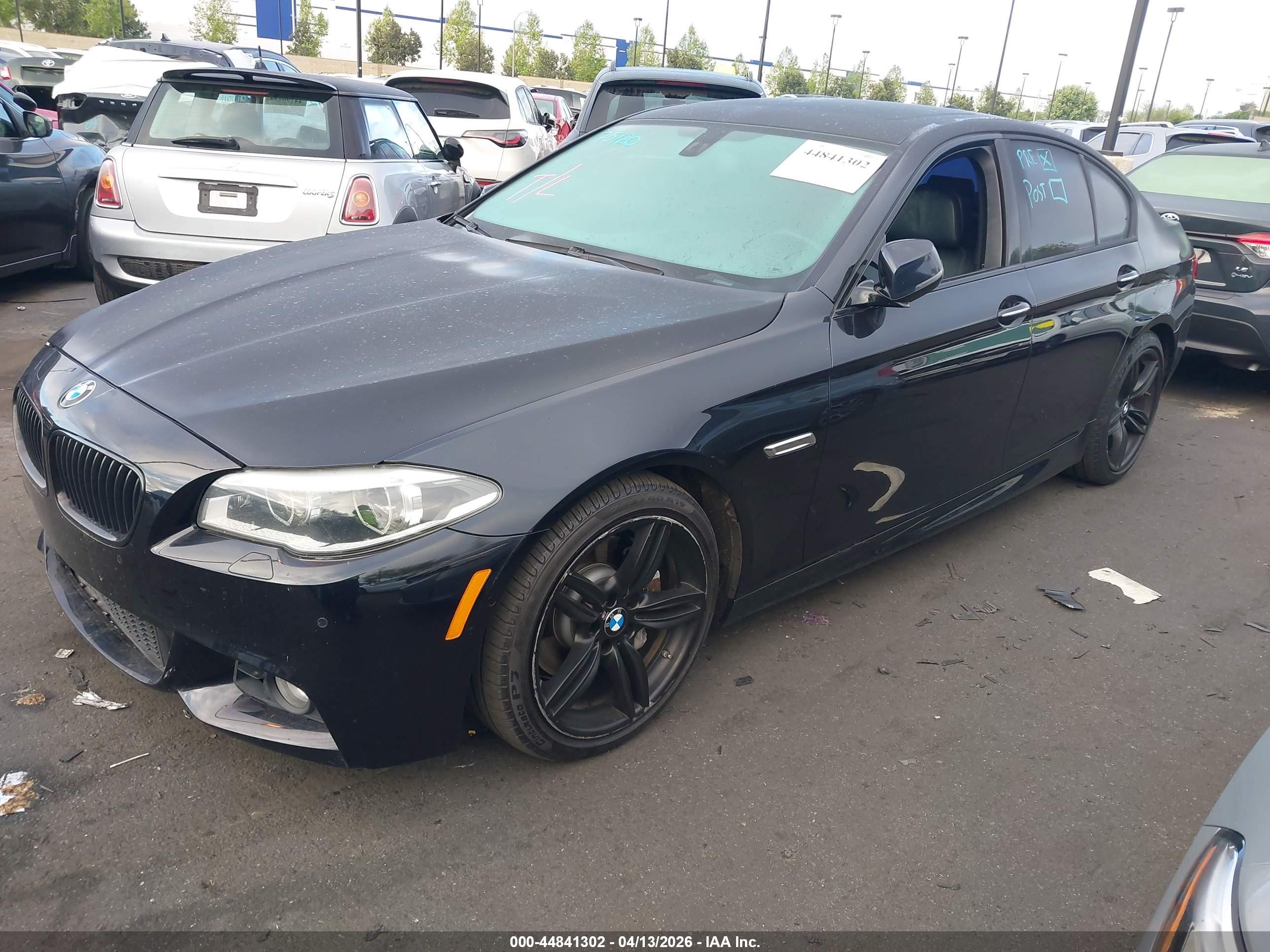 2015 BMW 5er VIN WBA5B1C54FD918202 IAAI salvage auction — Side, Salvage Certificate (California), sold $2,600 on 2026-10-03 (photo 2)
