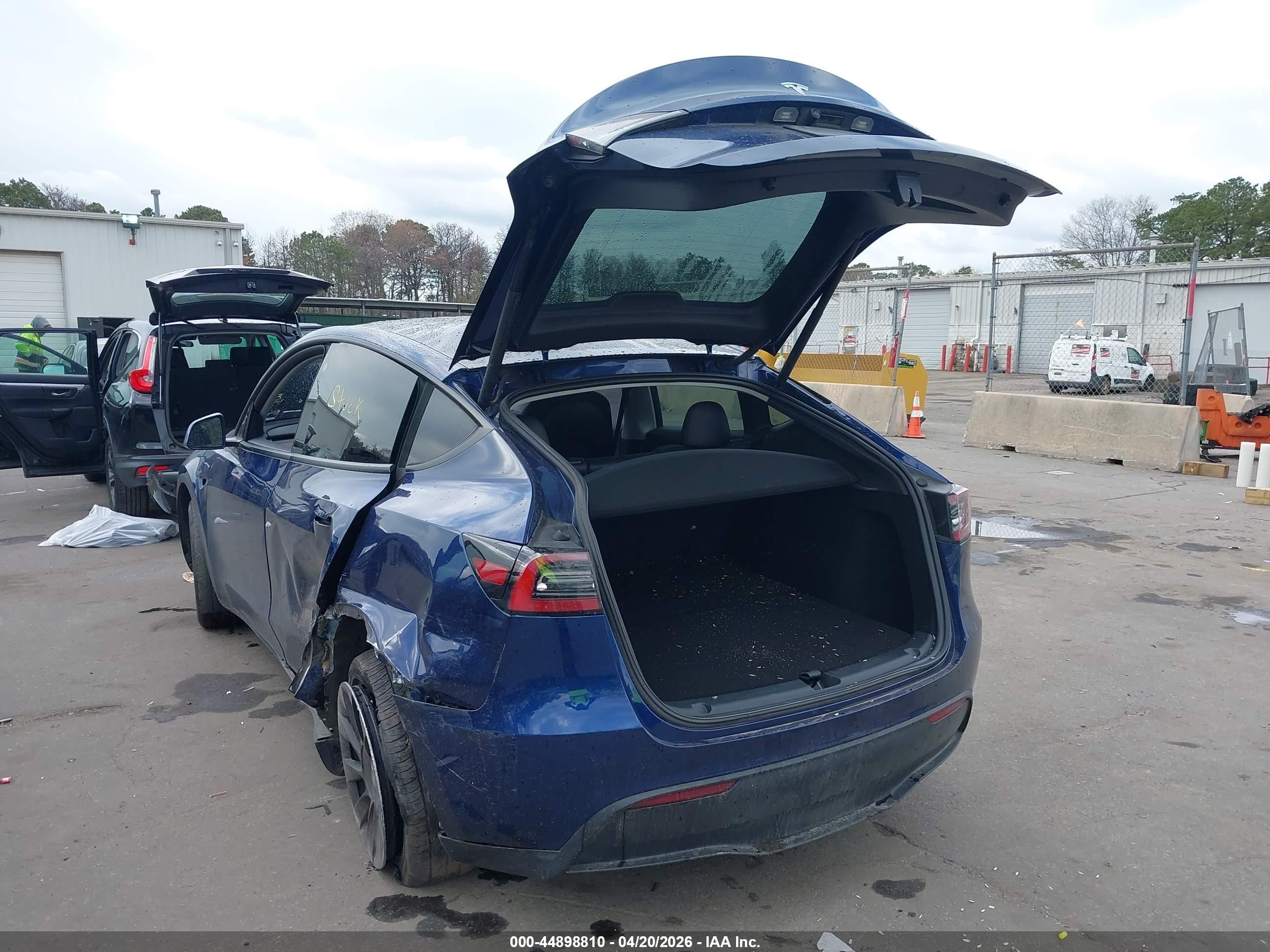 2023 Tesla Model Y VIN 7SAYGDEE9PF766981 IAAI salvage auction — Side, Mv-907A (New York), sold $12,825 on 2026-06-30 (photo 3)