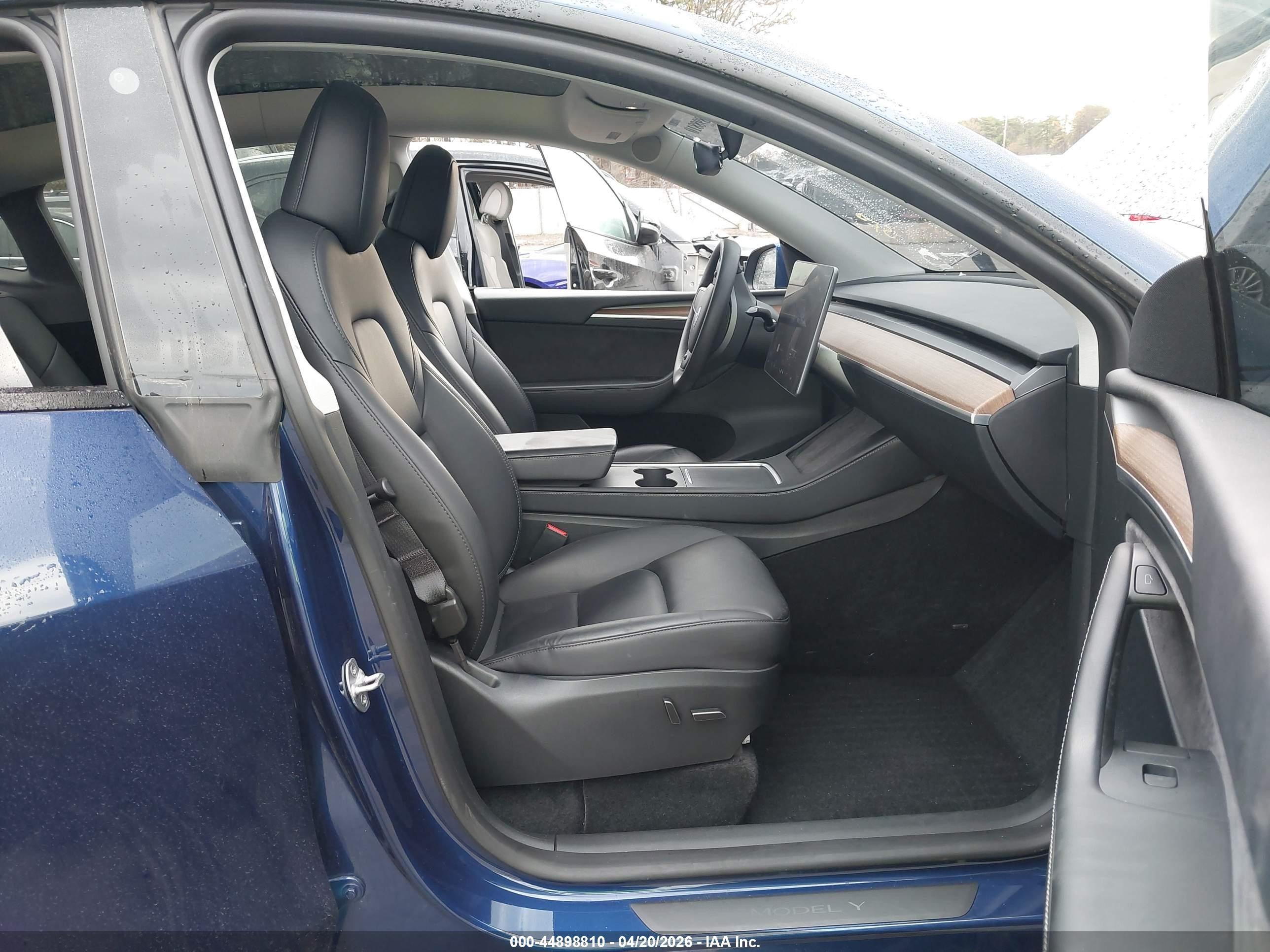 2023 Tesla Model Y VIN 7SAYGDEE9PF766981 IAAI salvage auction — Side, Mv-907A (New York), sold $12,825 on 2026-06-30 (photo 5)