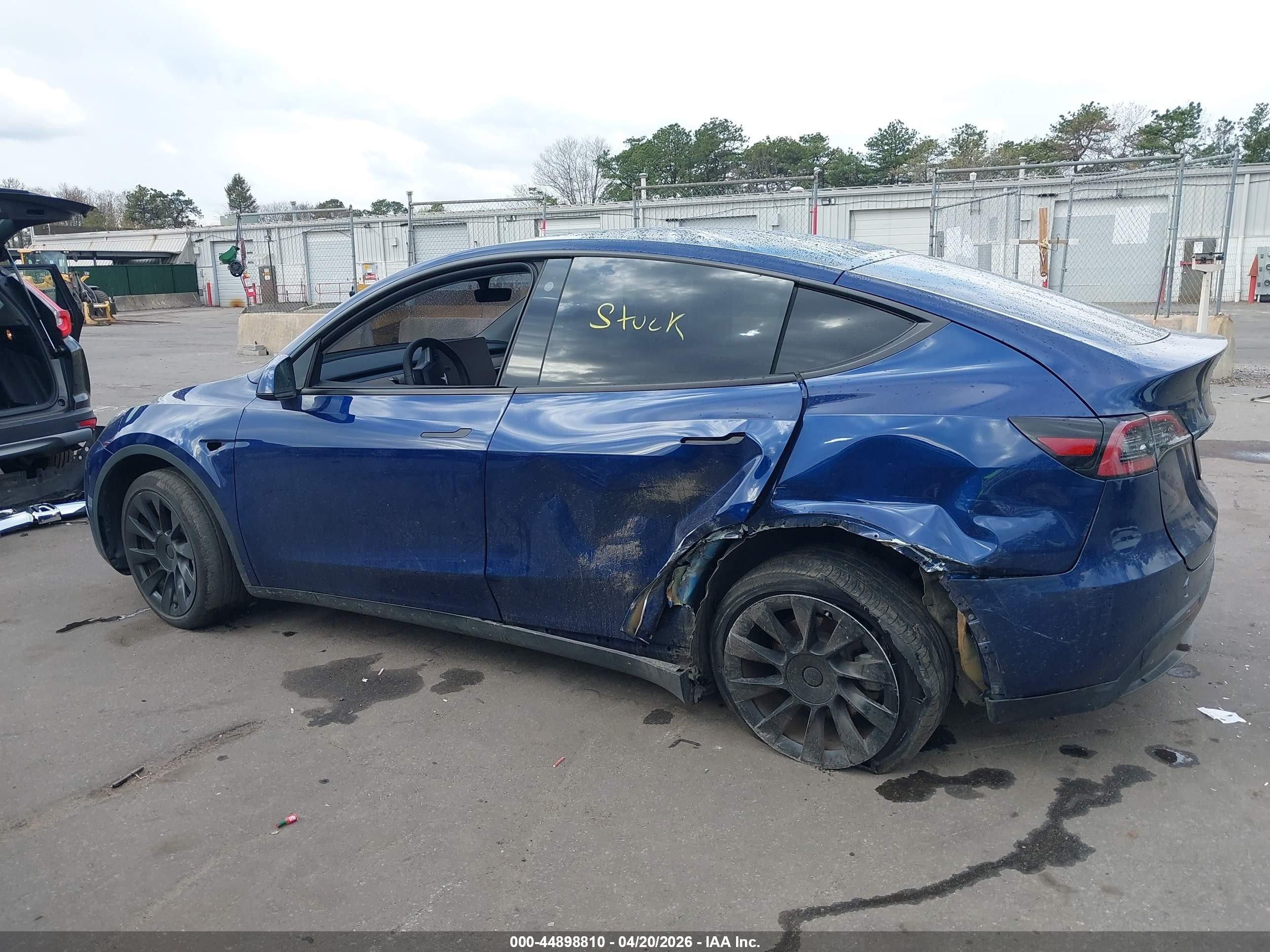 2023 Tesla Model Y VIN 7SAYGDEE9PF766981 IAAI salvage auction — Side, Mv-907A (New York), sold $12,825 on 2026-06-30 (photo 6)