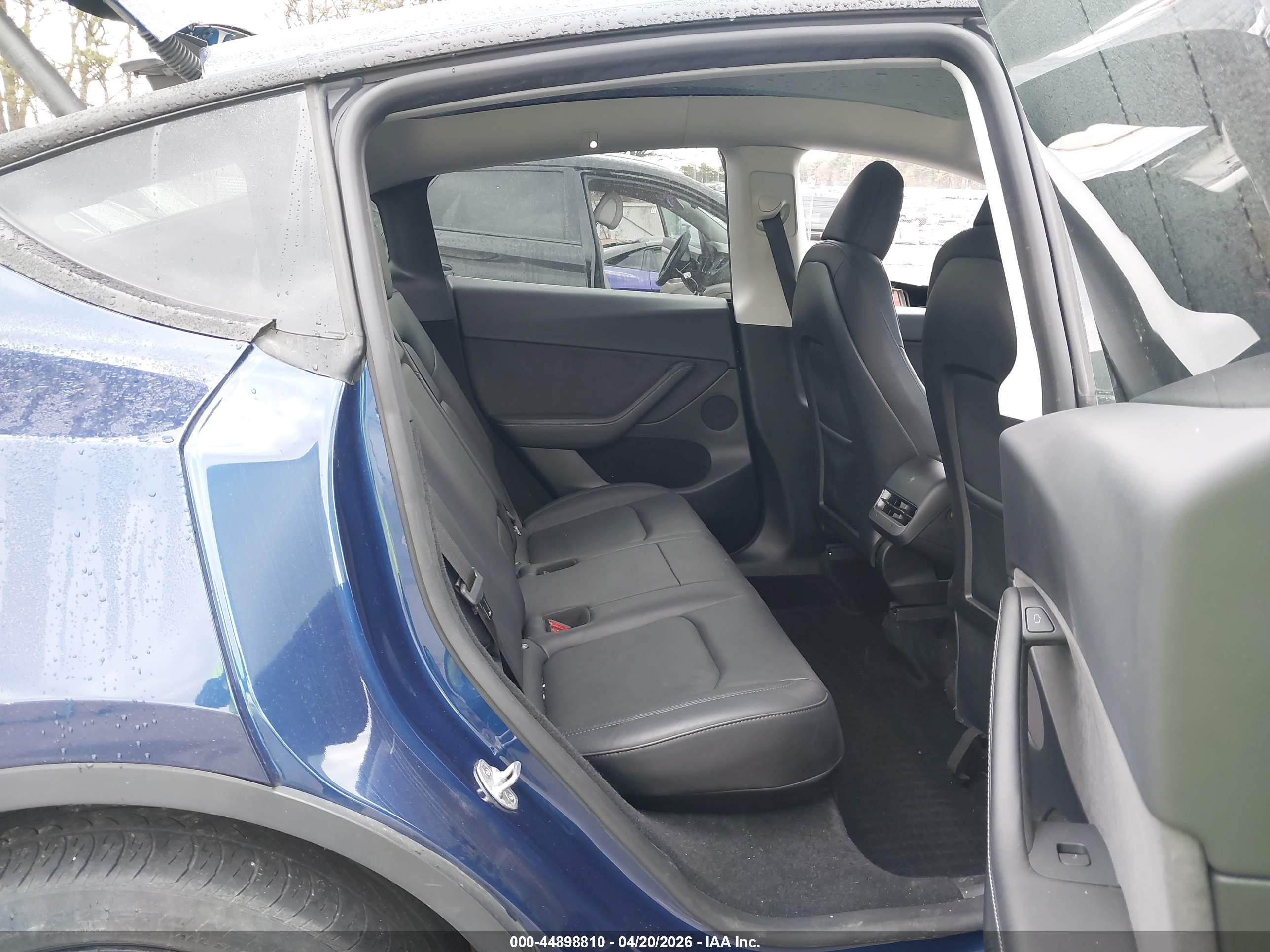 2023 Tesla Model Y VIN 7SAYGDEE9PF766981 IAAI salvage auction — Side, Mv-907A (New York), sold $12,825 on 2026-06-30 (photo 8)