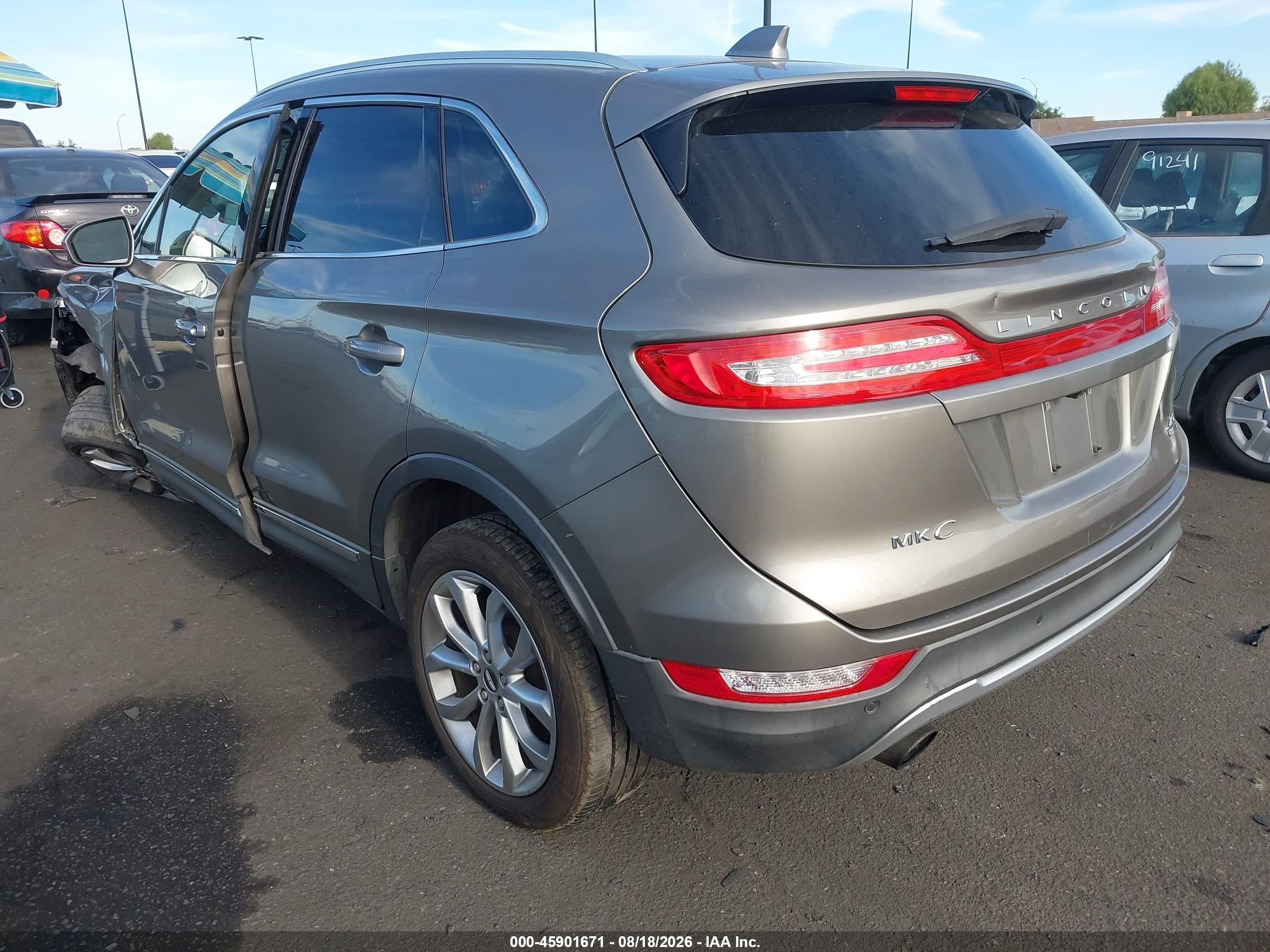 2016 Lincoln MKC VIN 5LMCJ2C90GUJ21946 IAAI salvage auction — Side, Salvage Certificate (California), sold $1,800 on 2026-09-13 (photo 3)