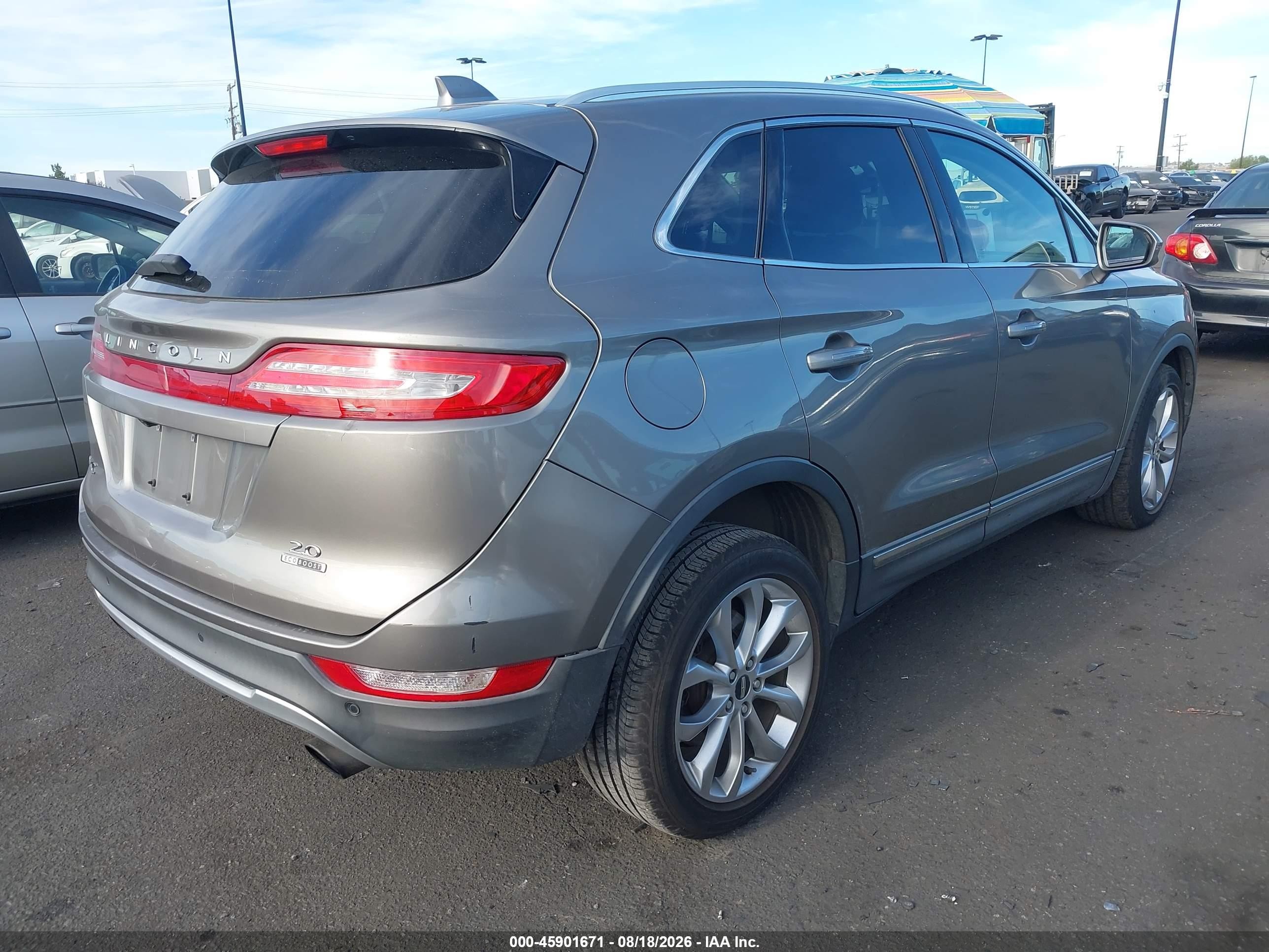 2016 Lincoln MKC VIN 5LMCJ2C90GUJ21946 IAAI salvage auction — Side, Salvage Certificate (California), sold $1,800 on 2026-09-13 (photo 4)