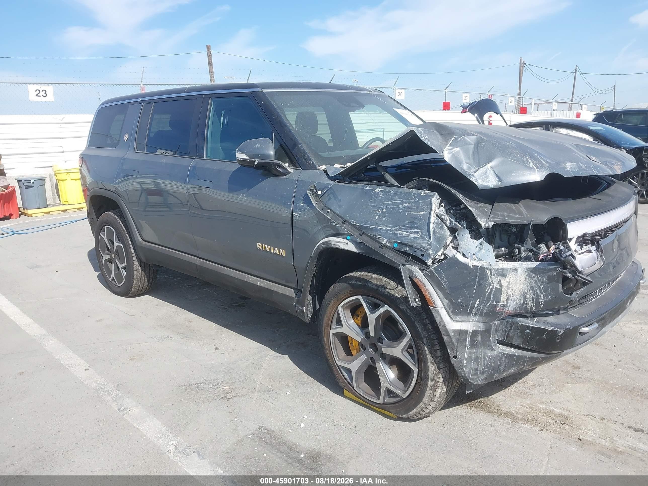 2023 Rivian R1S VIN 7PDSGABA8PN009096 — IAAI salvage auction photo
