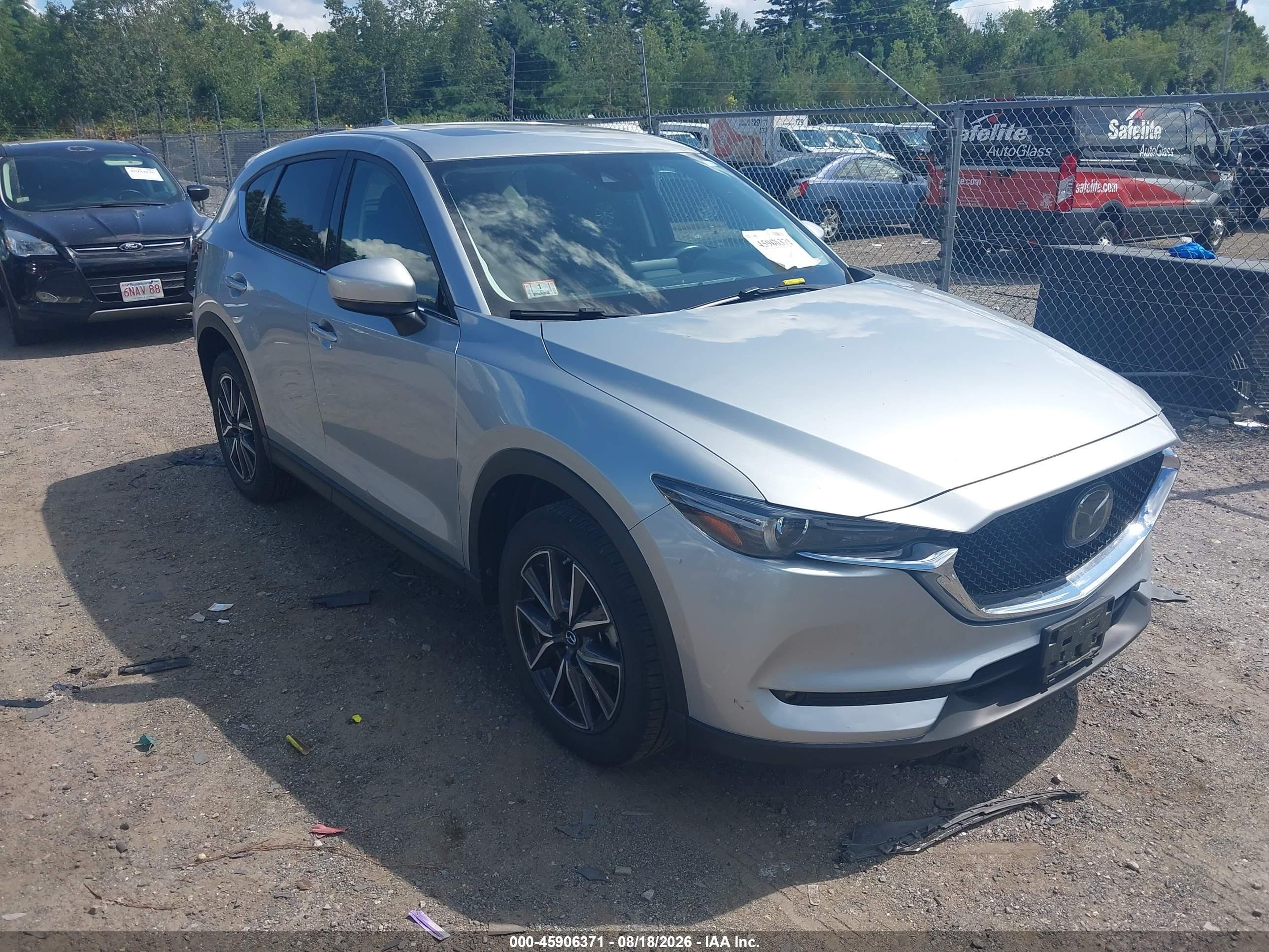 2018 Mazda CX-5 VIN JM3KFBDM9J0403242 — IAAI salvage auction photo
