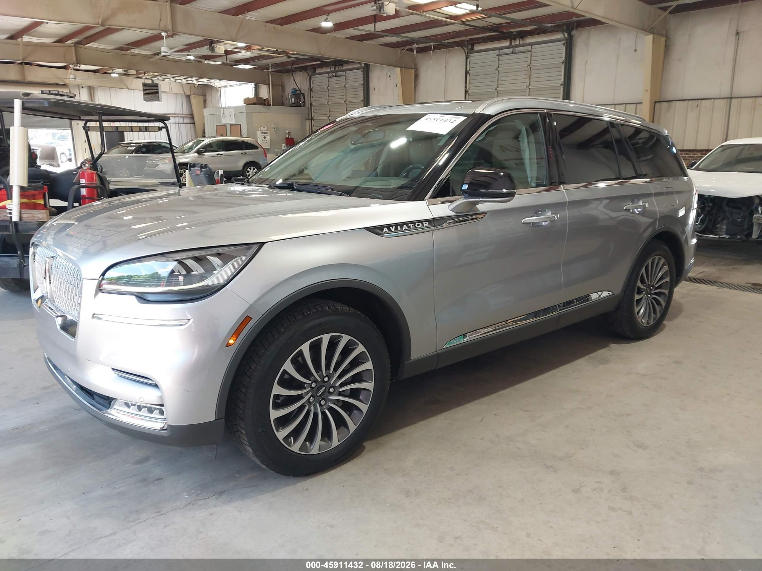2021 Lincoln Aviator VIN 5LM5J7XC8MGL03447 IAAI salvage auction — Side, Salvage (North Carolina), sold $9,150 on 2026-09-17 (photo 2)