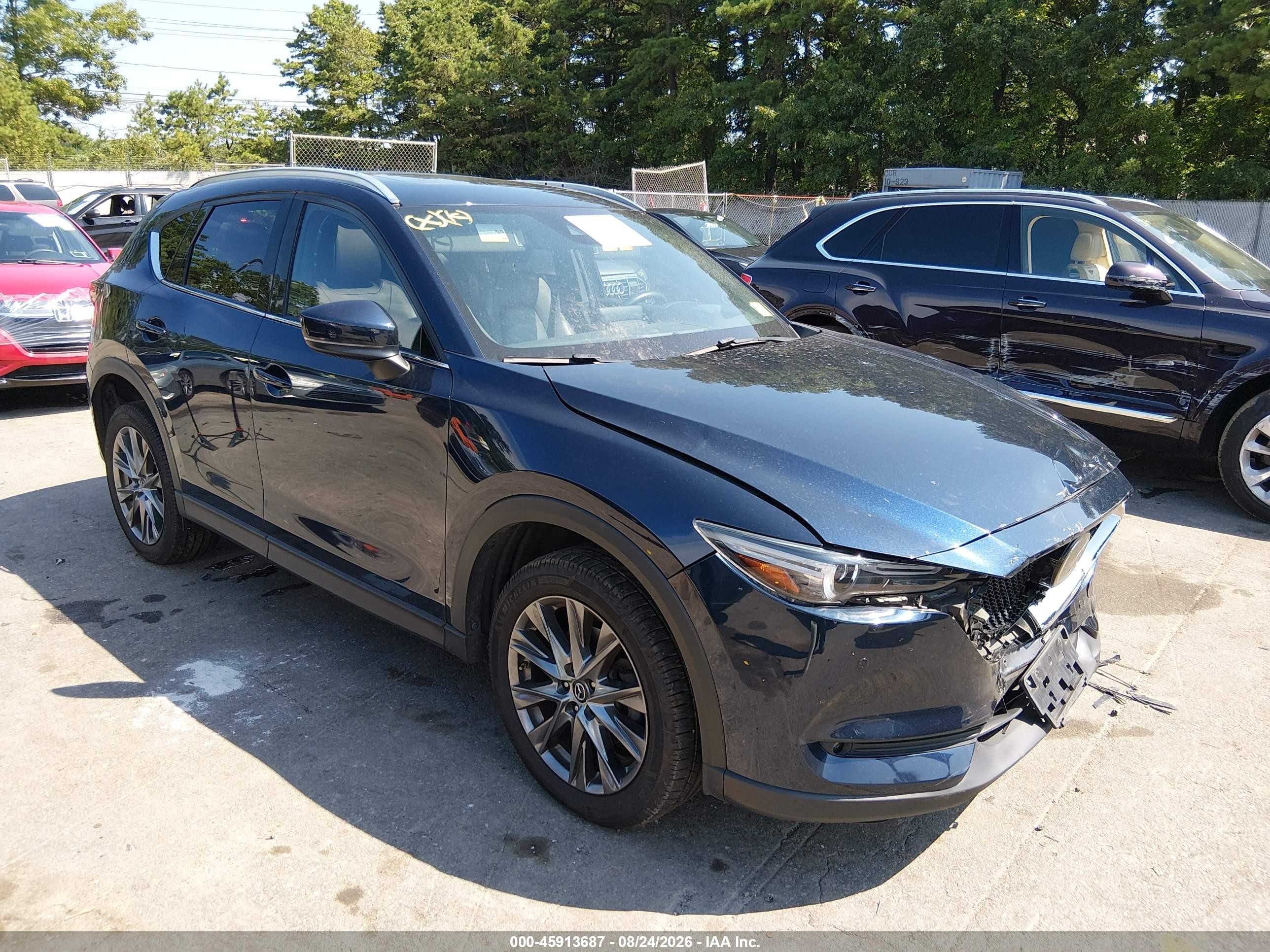 2020 Mazda CX-5 VIN JM3KFBEY3L0843607 — IAAI salvage auction photo