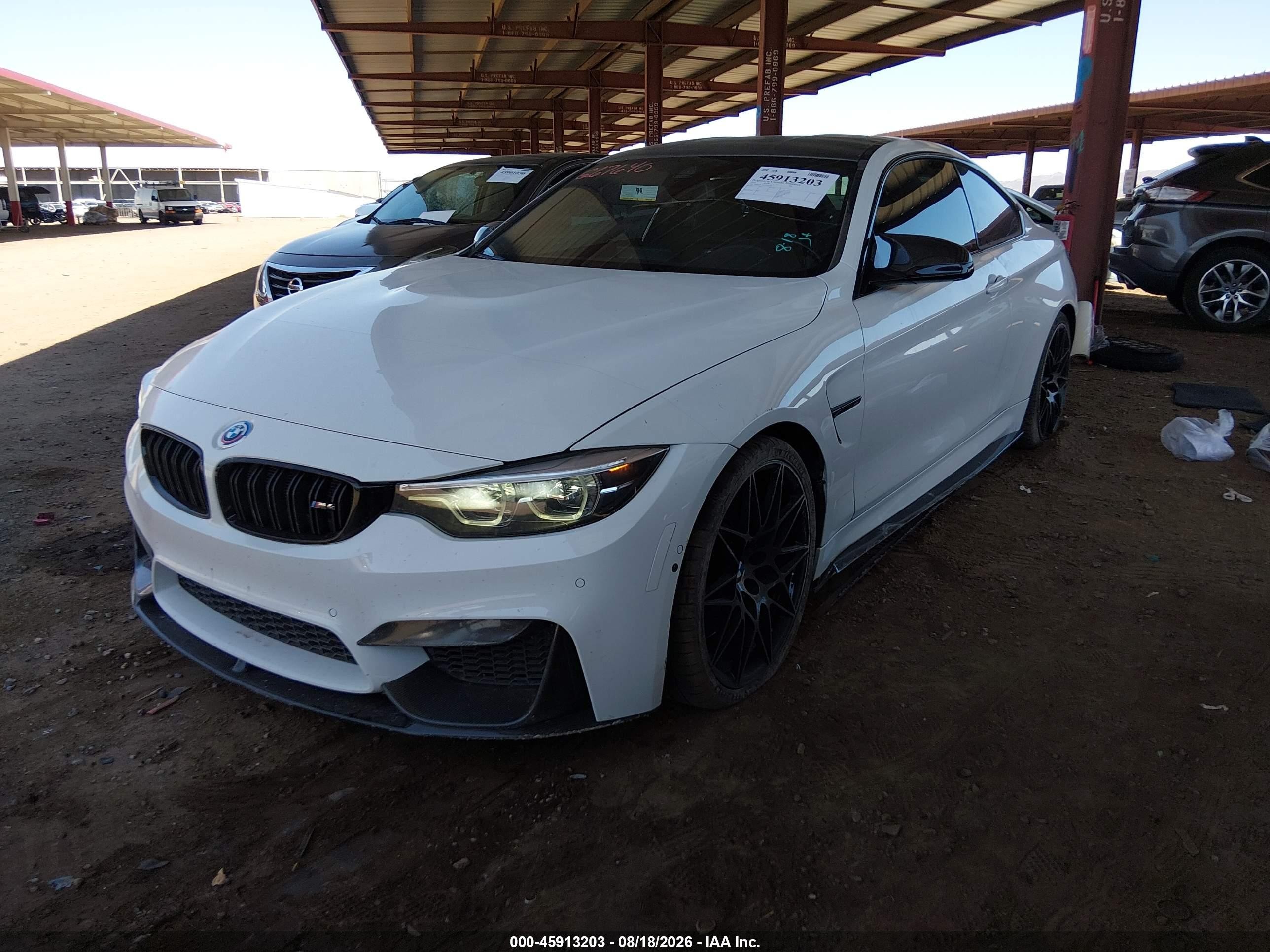 2019 BMW M4 VIN WBS4Y9C56KAG67640 IAAI salvage auction — Side, Salvage (Arizona), sold $23,100 on 2026-09-14 (photo 2)