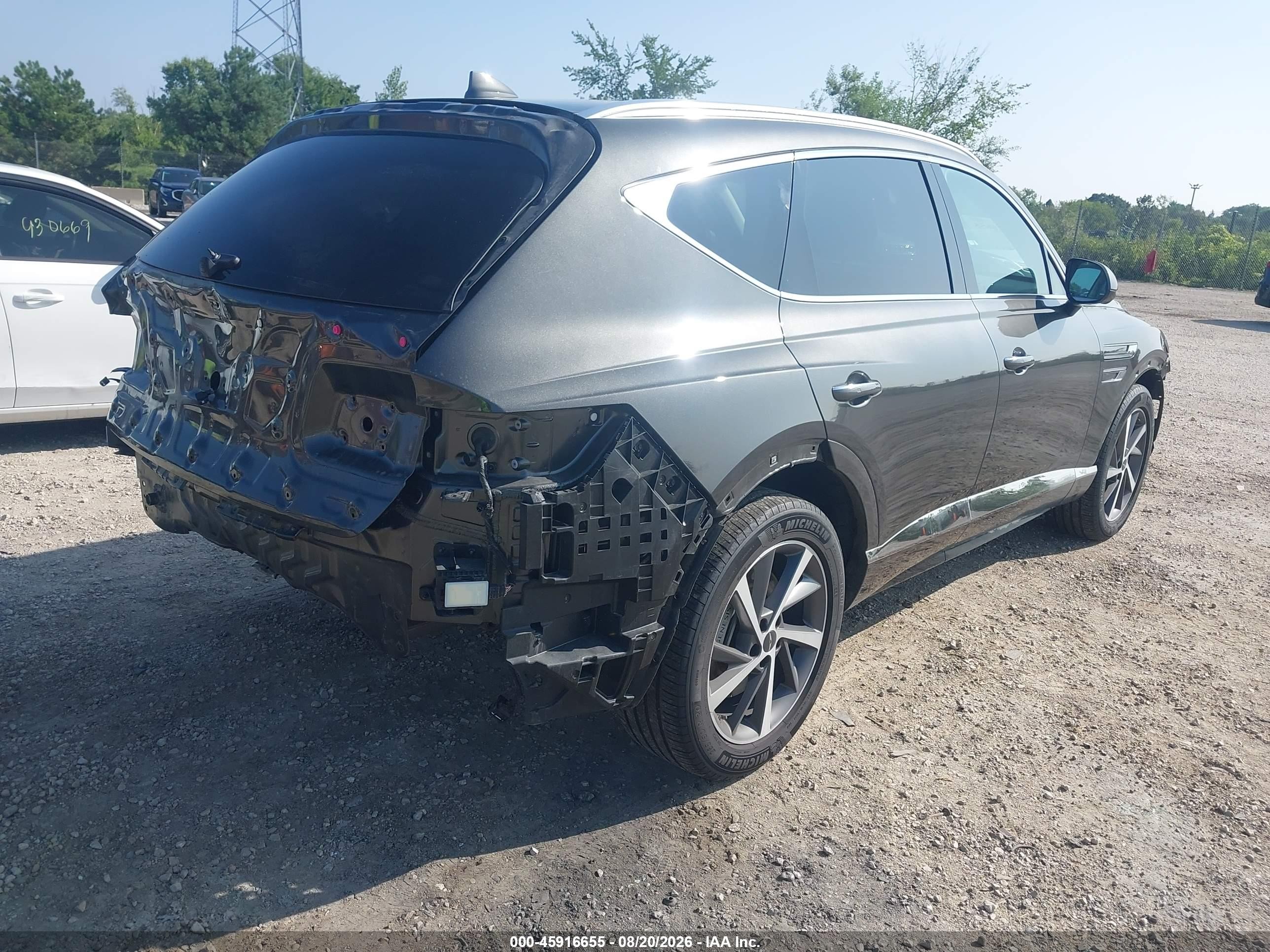 2025 Genesis Gv80 VIN KMUHBESBXSU274503 IAAI salvage auction — Front & Rear, Clear Claim Paid (Wisconsin), sold $14,100 on 2026-09-24 (photo 4)