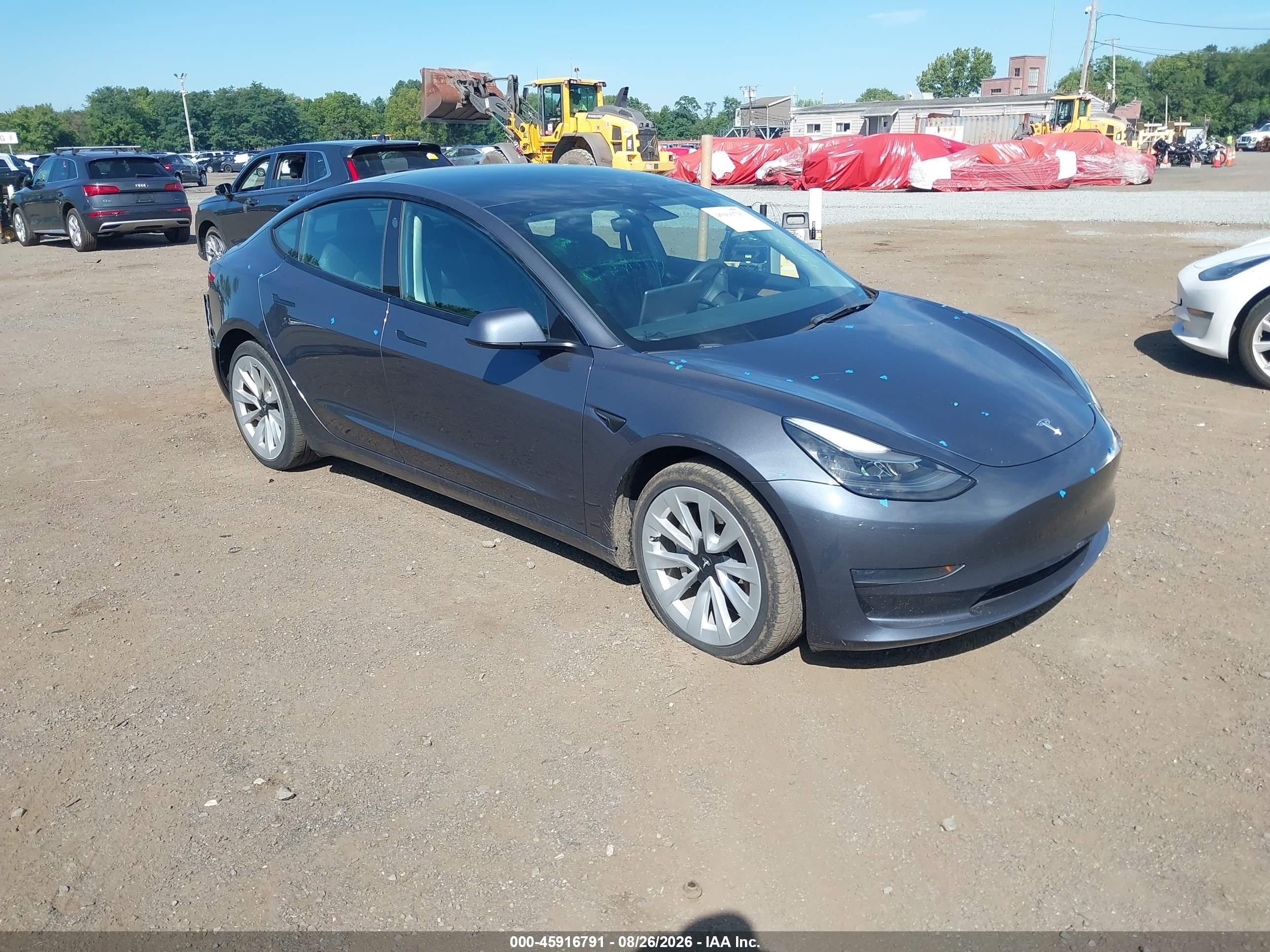 2023 Tesla Model 3 VIN 5YJ3E1EA9PF446844 — IAAI salvage auction photo