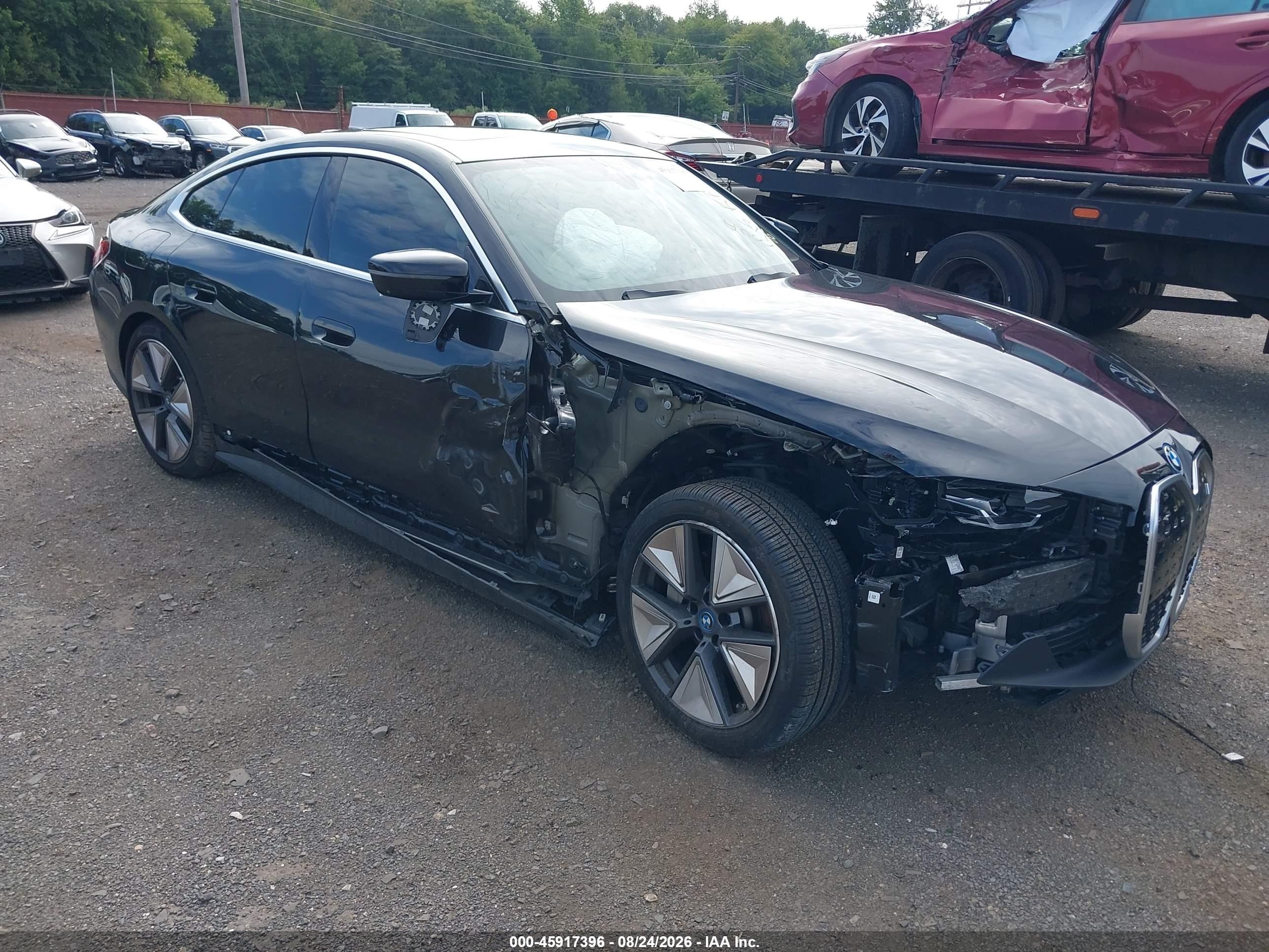 2024 BMW i4 VIN WBY43AW03RFT15986 — IAAI salvage auction photo