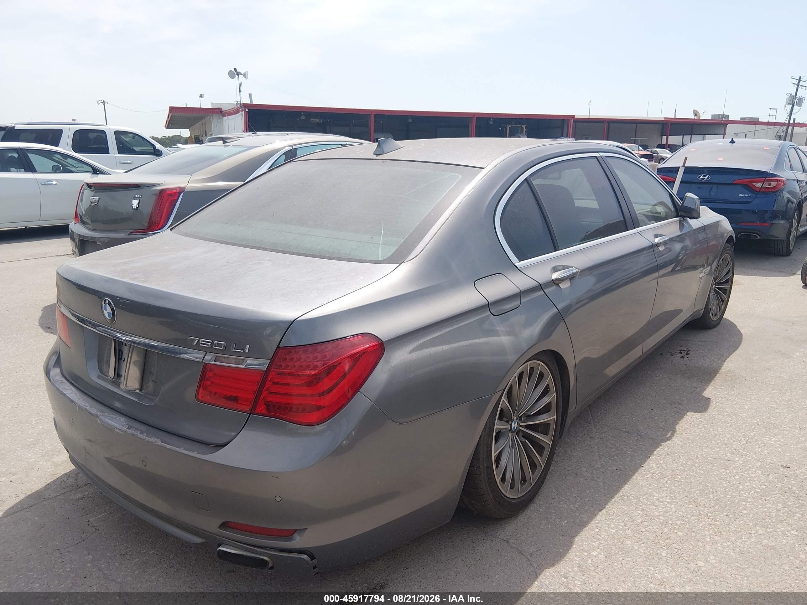 2012 BMW 7er VIN WBAKB8C50CC964963 IAAI salvage auction — Normal Wear, Original (Texas), sold $1,500 on 2026-09-12 (photo 4)