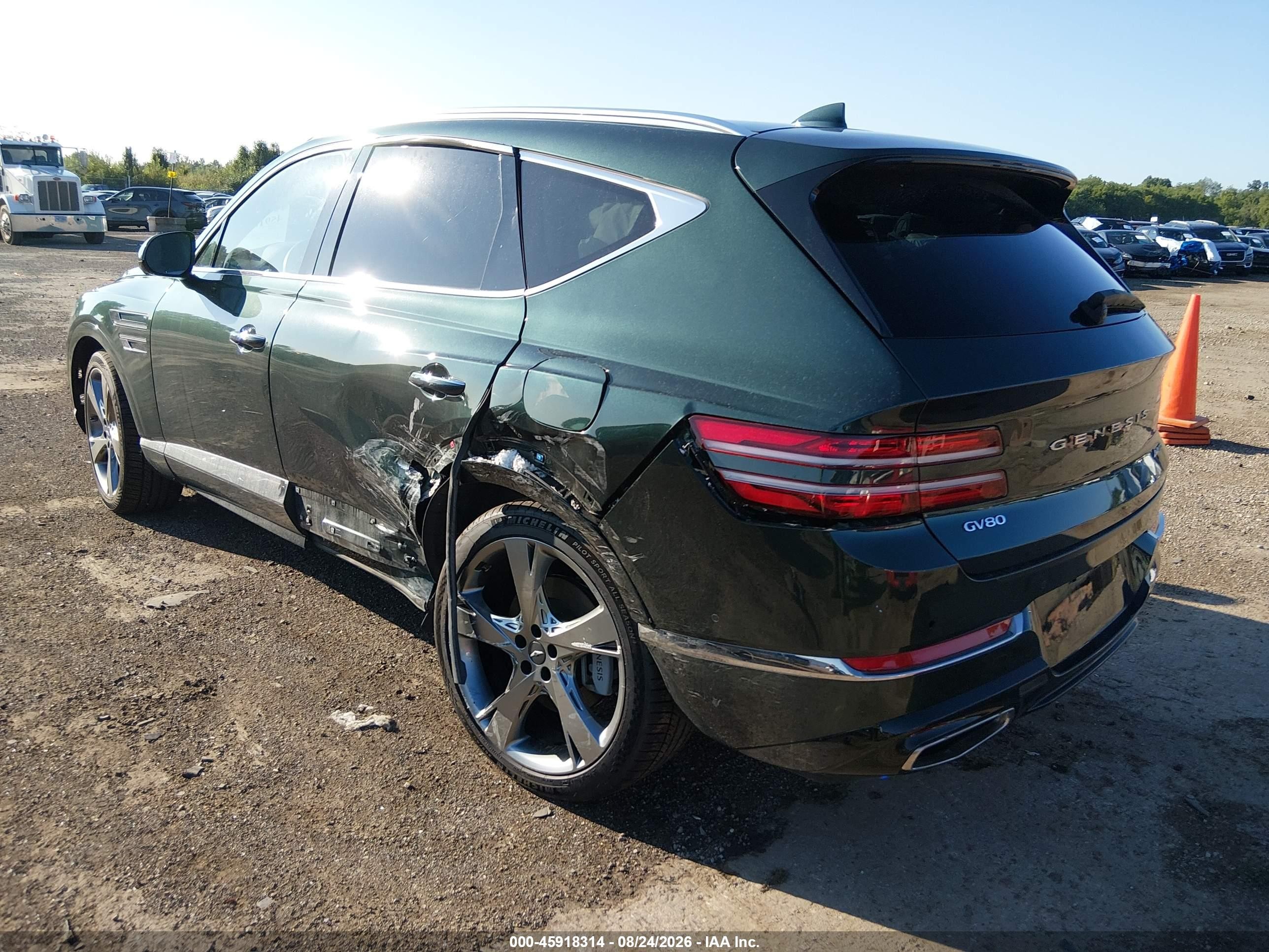 2023 Genesis GV80 VIN KMUHCESC9PU114819 IAAI salvage auction — Side, Salvage (Ohio), sold $16,600 on 2026-09-13 (photo 3)
