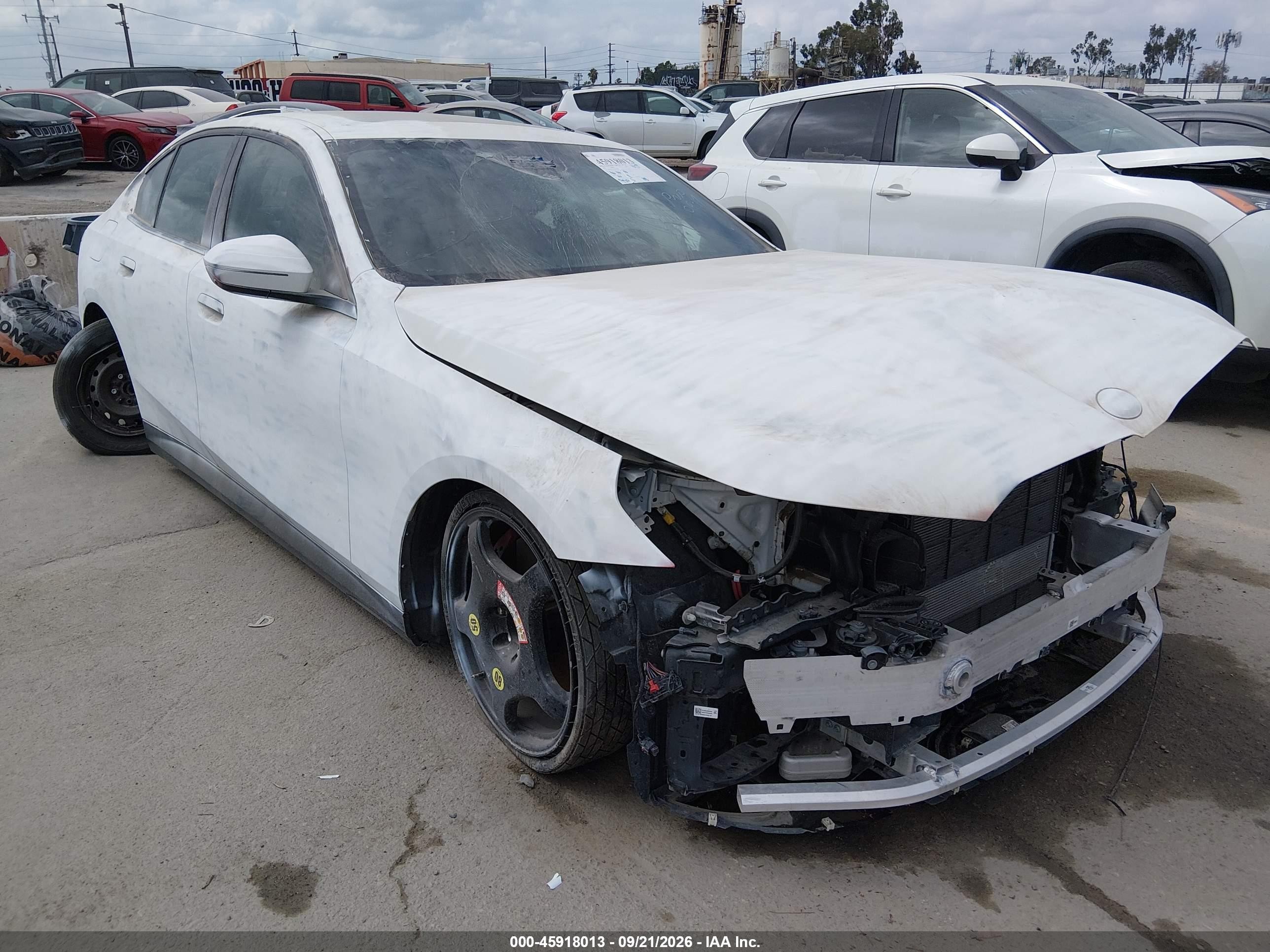 2026 BMW 5 Series VIN WBA63FJ01TCW08399 — IAAI salvage auction photo