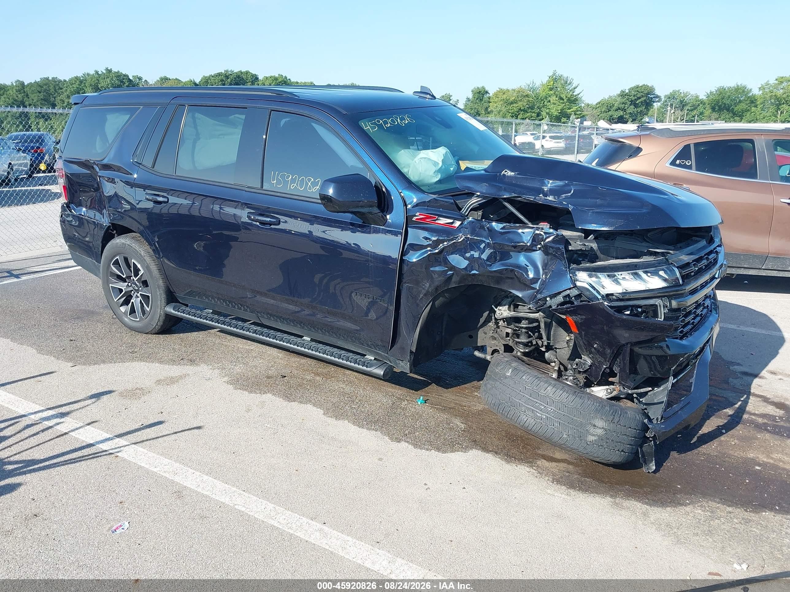 2021 Chevrolet Tahoe VIN 1GNSKPKDXMR185243 — IAAI salvage auction photo