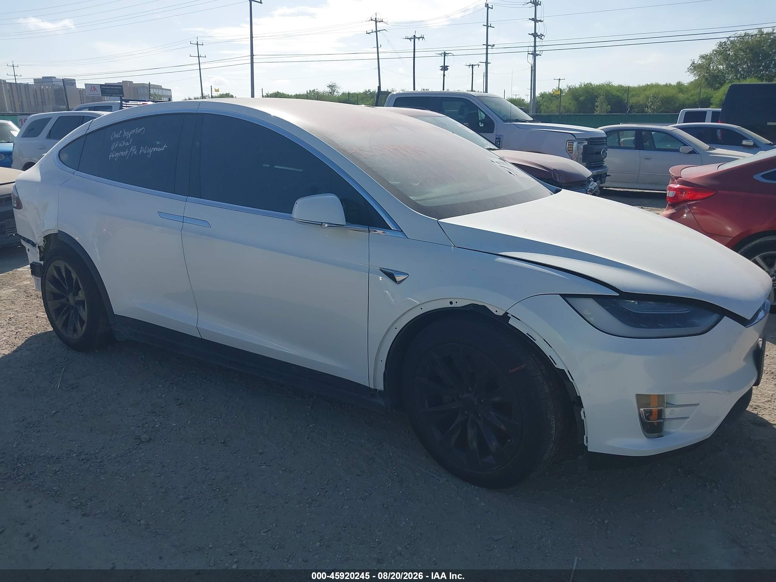 2019 Tesla Model X VIN 5YJXCBE27KF185972 — IAAI salvage auction photo
