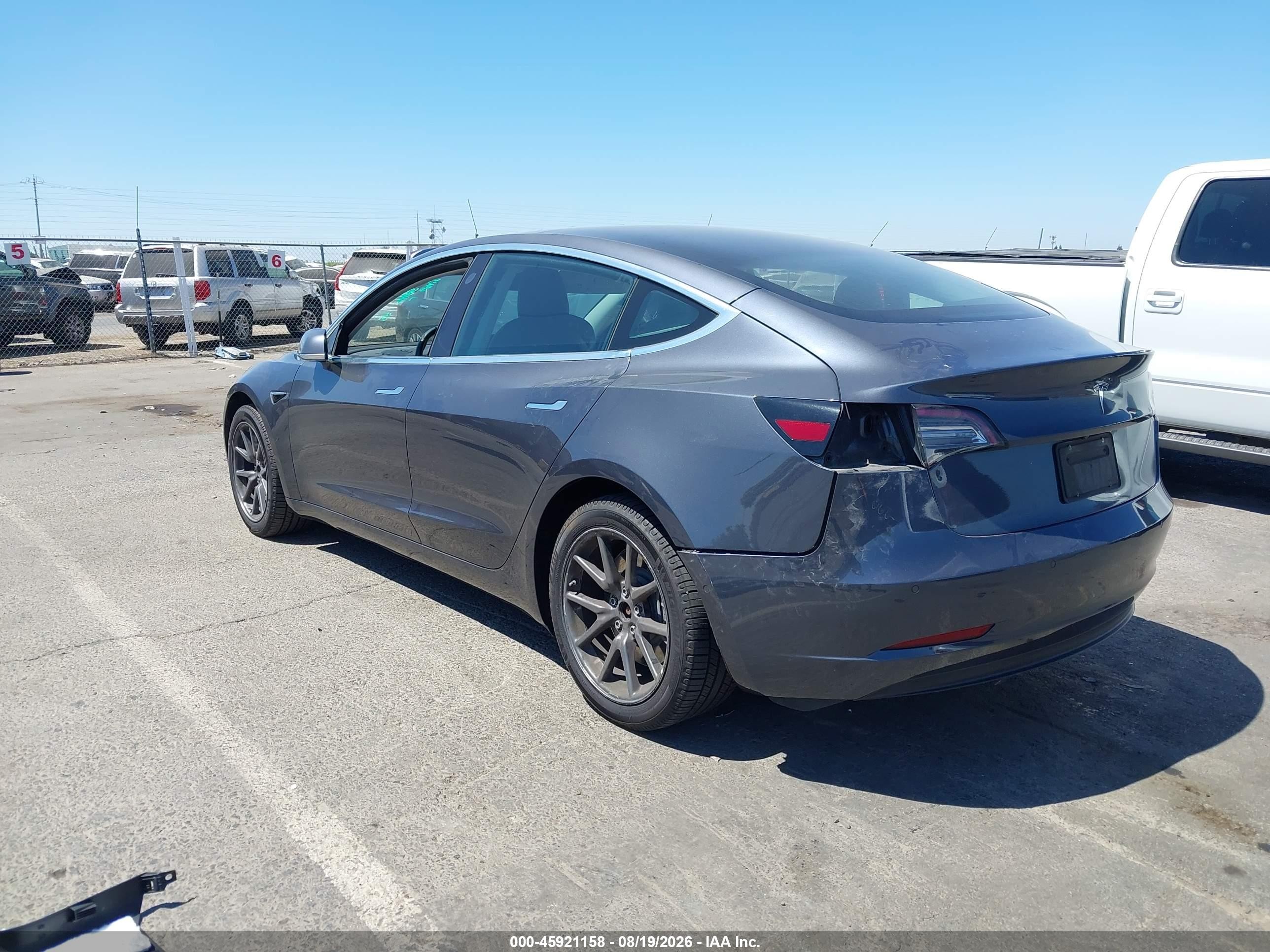 2019 Tesla Model 3 VIN 5YJ3E1EA7KF447435 IAAI salvage auction — Side, Salvage (California), sold $4,300 on 2026-09-02 (photo 3)