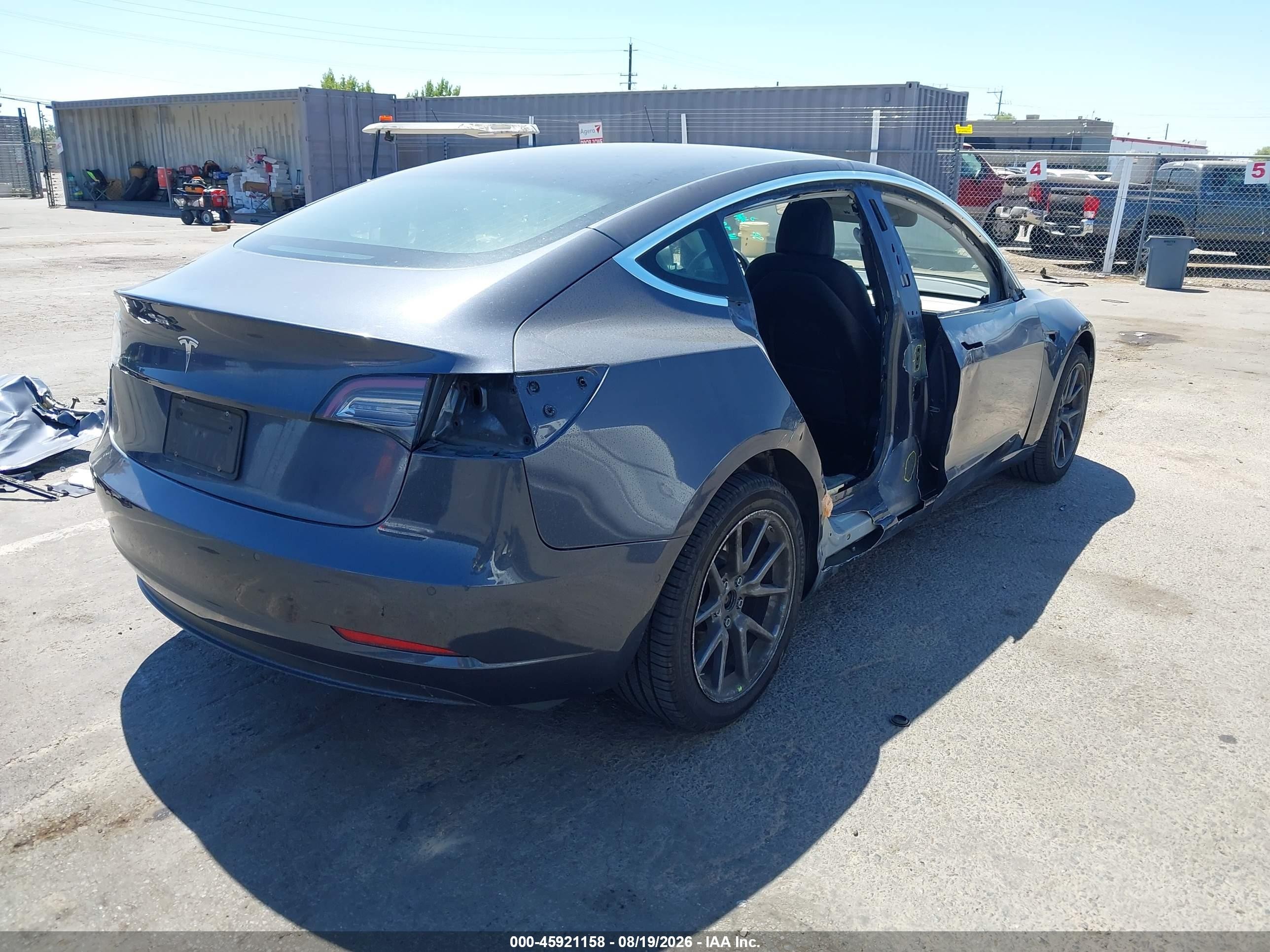 2019 Tesla Model 3 VIN 5YJ3E1EA7KF447435 IAAI salvage auction — Side, Salvage (California), sold $4,300 on 2026-09-02 (photo 4)
