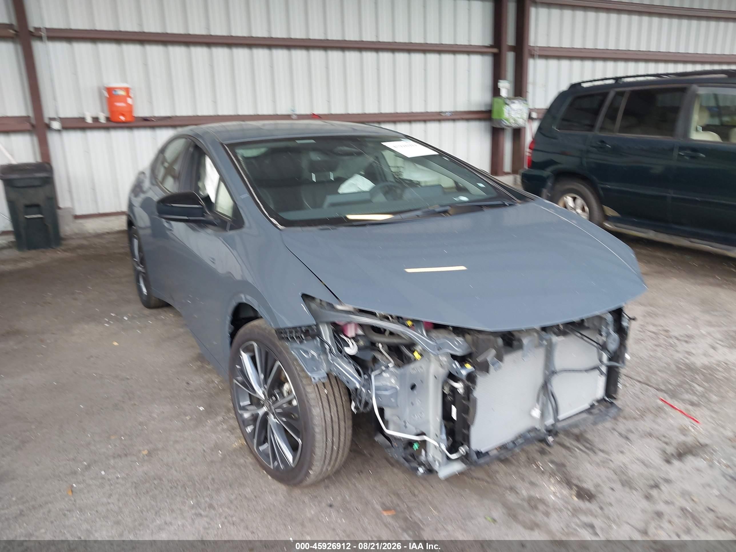 2025 Toyota Prius VIN JTDACAAU4S3062182 — IAAI salvage auction photo