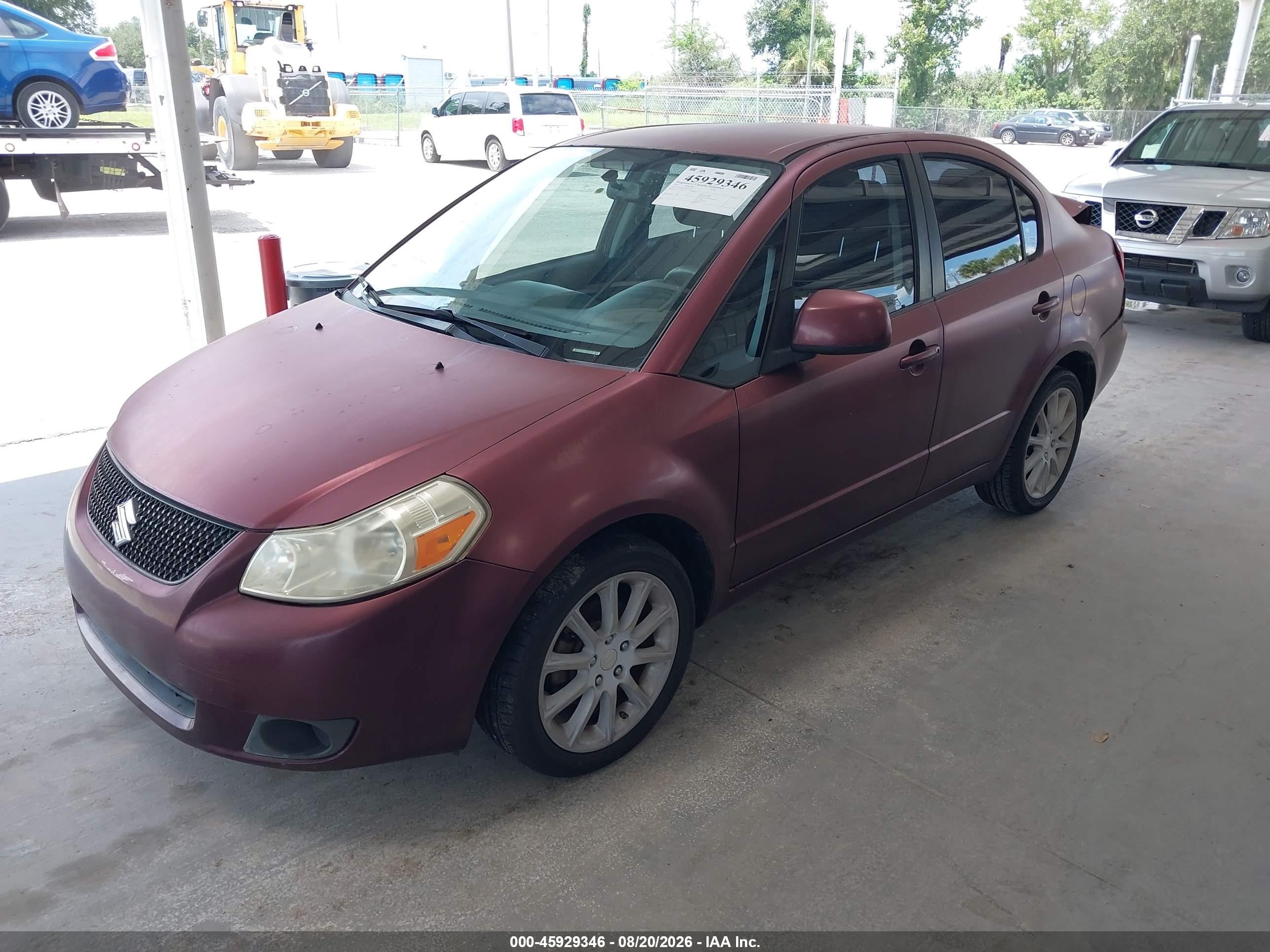 2011 Suzuki Sx4 VIN JS2YC5A27B6303273 IAAI salvage auction — Rear End, Rebuildable (Florida), sold $500 on 2026-09-09 (photo 2)
