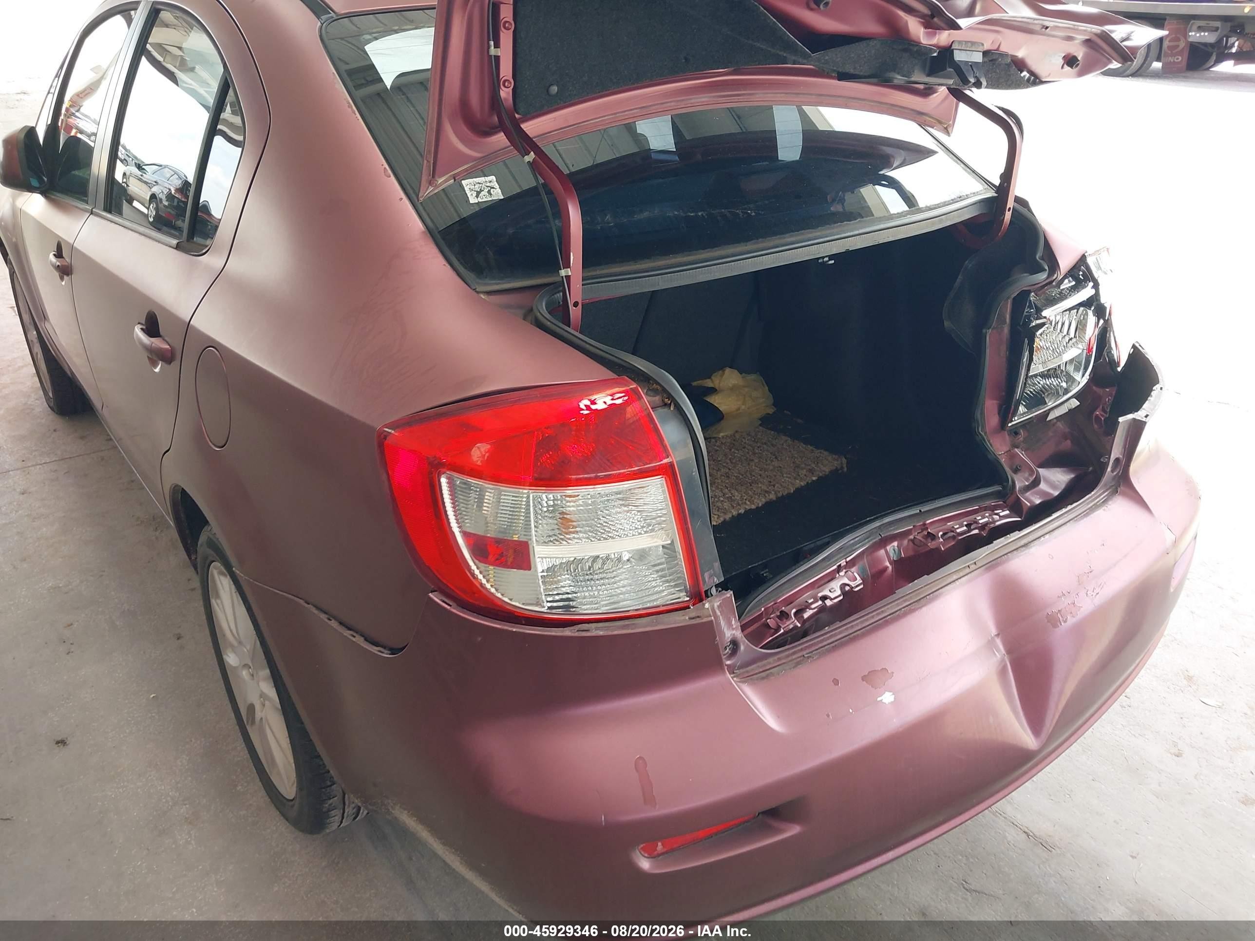 2011 Suzuki Sx4 VIN JS2YC5A27B6303273 IAAI salvage auction — Rear End, Rebuildable (Florida), sold $500 on 2026-09-09 (photo 6)