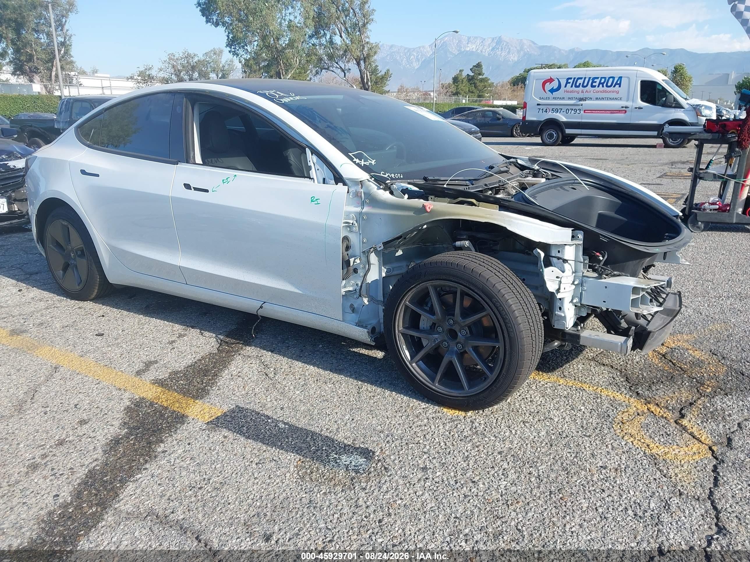 2023 Tesla Model 3 VIN 5YJ3E1EA1PF494354 — IAAI salvage auction photo