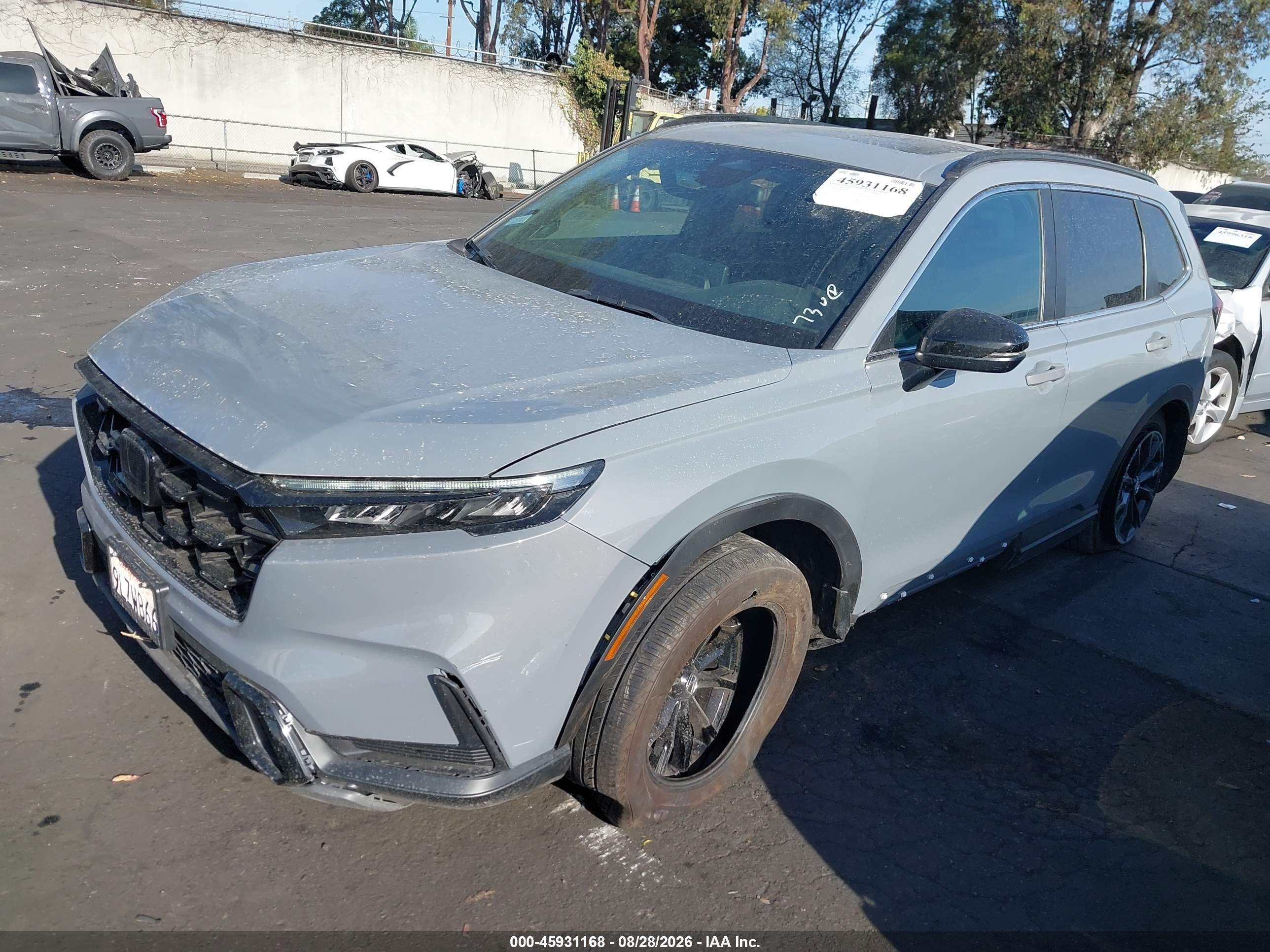 2024 Honda Cr-v VIN 7FARS5H59RE033712 IAAI salvage auction — Side, Salvage Certificate (California), sold $11,700 on 2026-09-12 (photo 2)