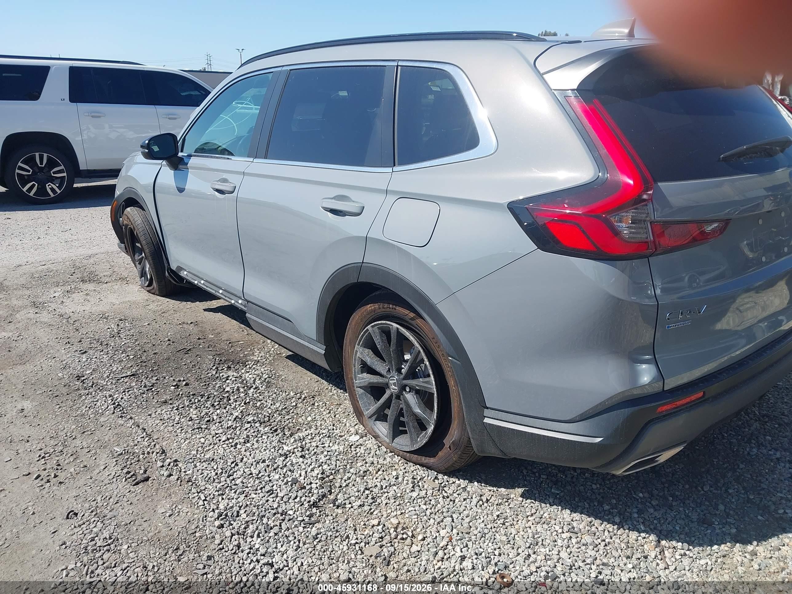 2024 Honda Cr-v VIN 7FARS5H59RE033712 IAAI salvage auction — Side, Salvage Certificate (California), sold $11,700 on 2026-09-12 (photo 3)
