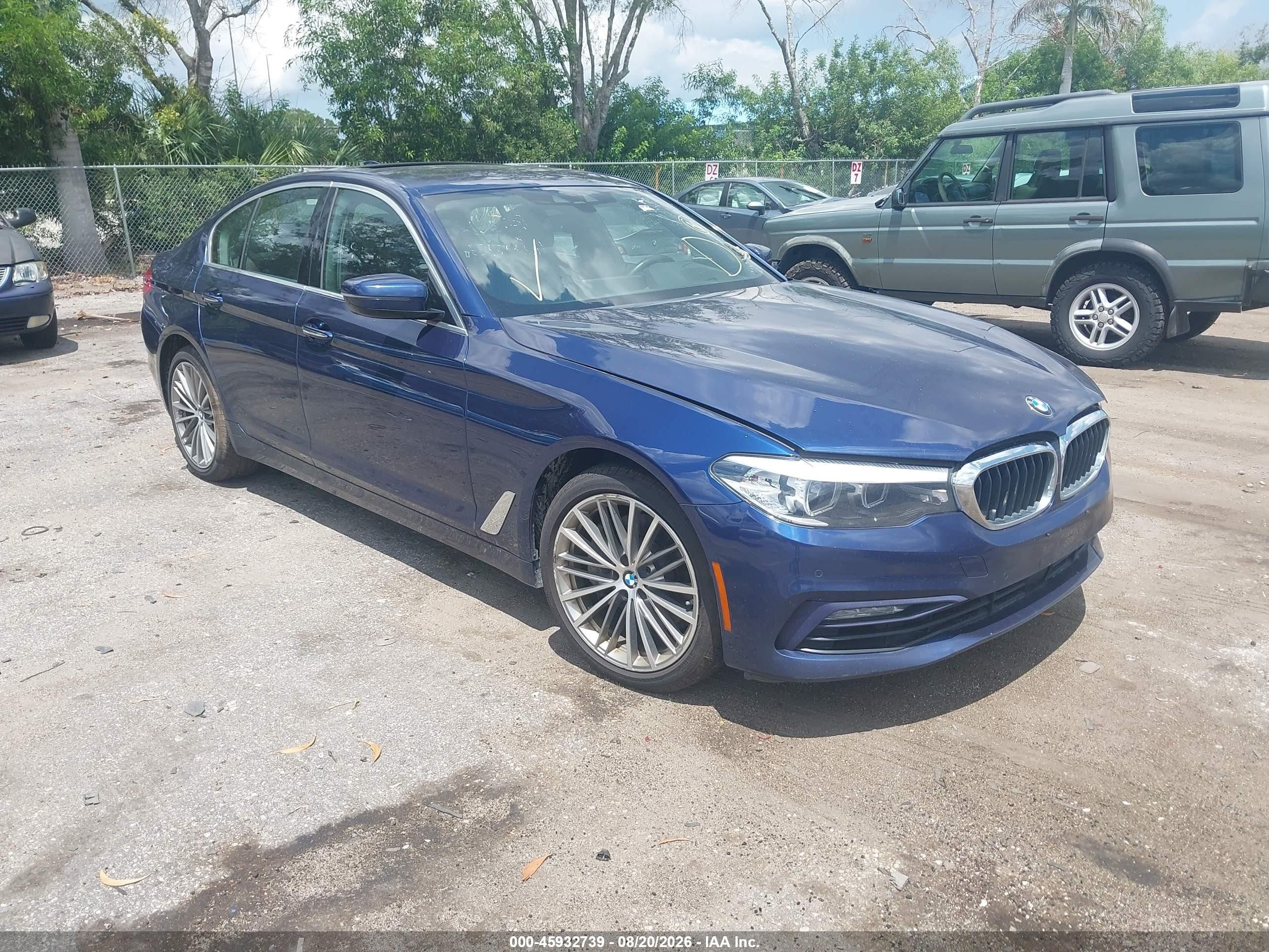 2018 BMW 5 Series VIN WBAJE7C55JG891379 — IAAI salvage auction photo